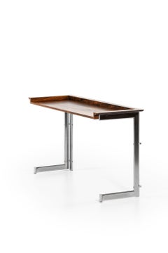 Tavolino in palissandro e acciaio cromato di Jan Lunde Knudsen, anni '60