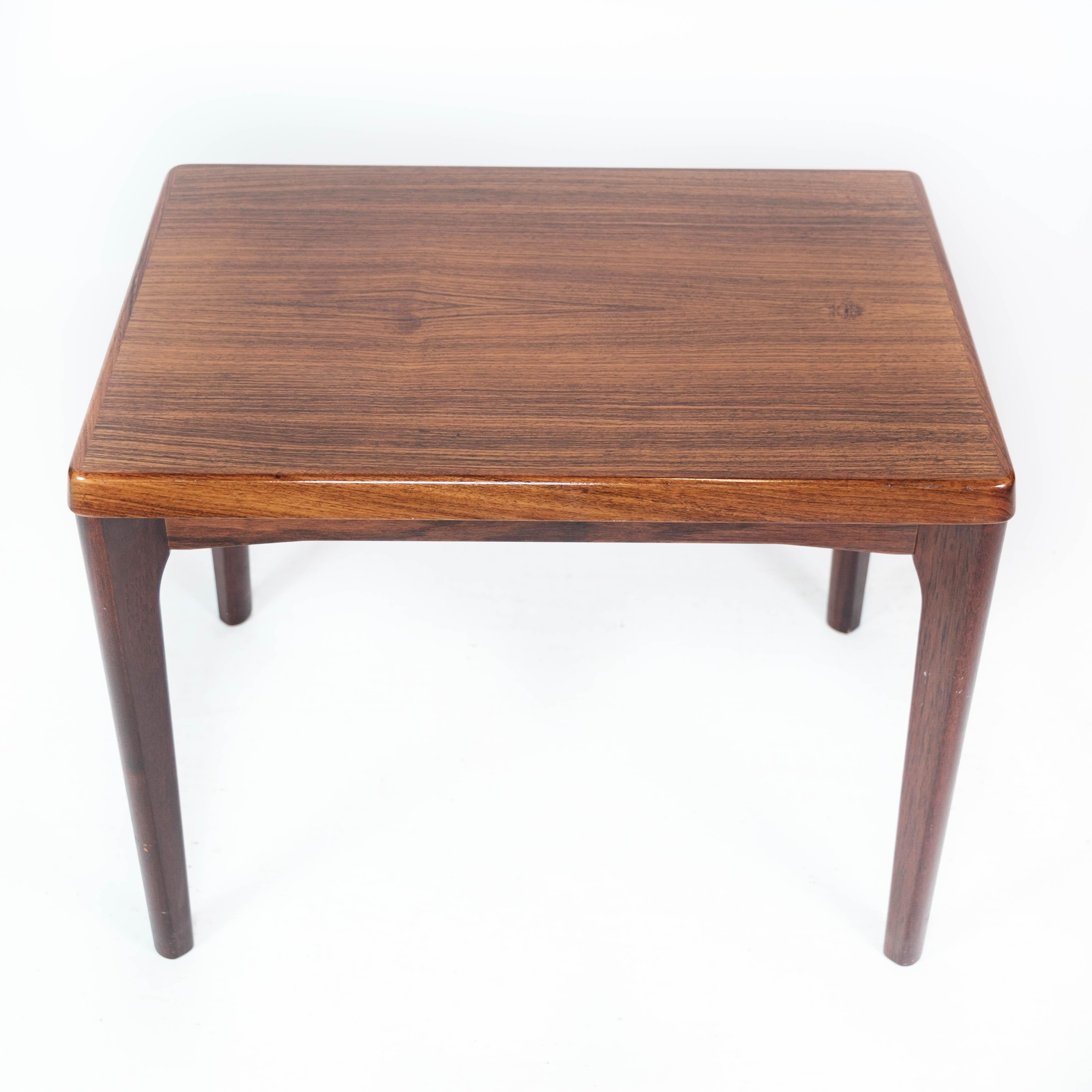 Side table in rosewood designed by Henning Kjærnulf and manufactured by Vejle Furniture in the 1960s. The table is in great vintage condition.