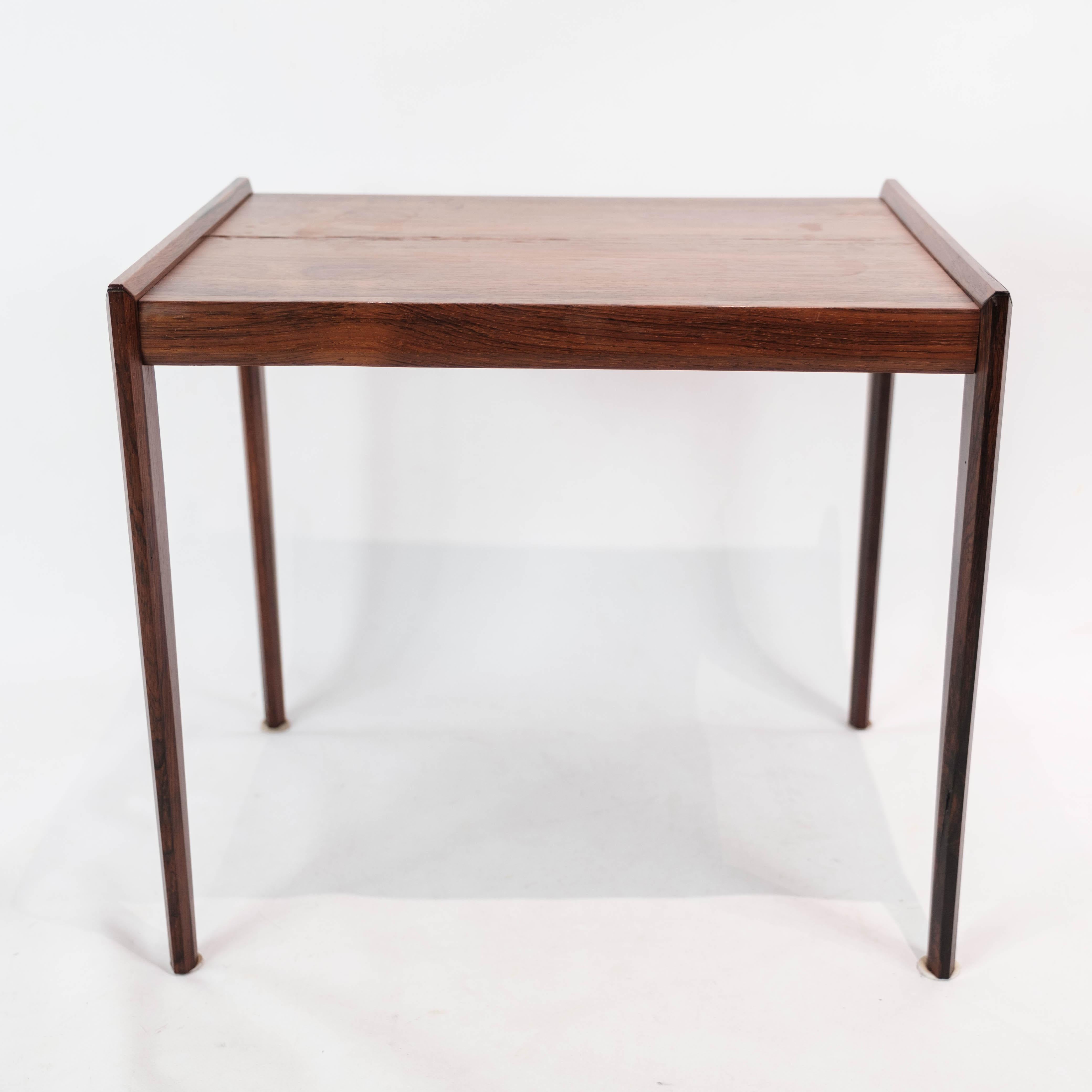 Side table in rosewood of Danish design from the 1960s. The table is in great vintage condition.