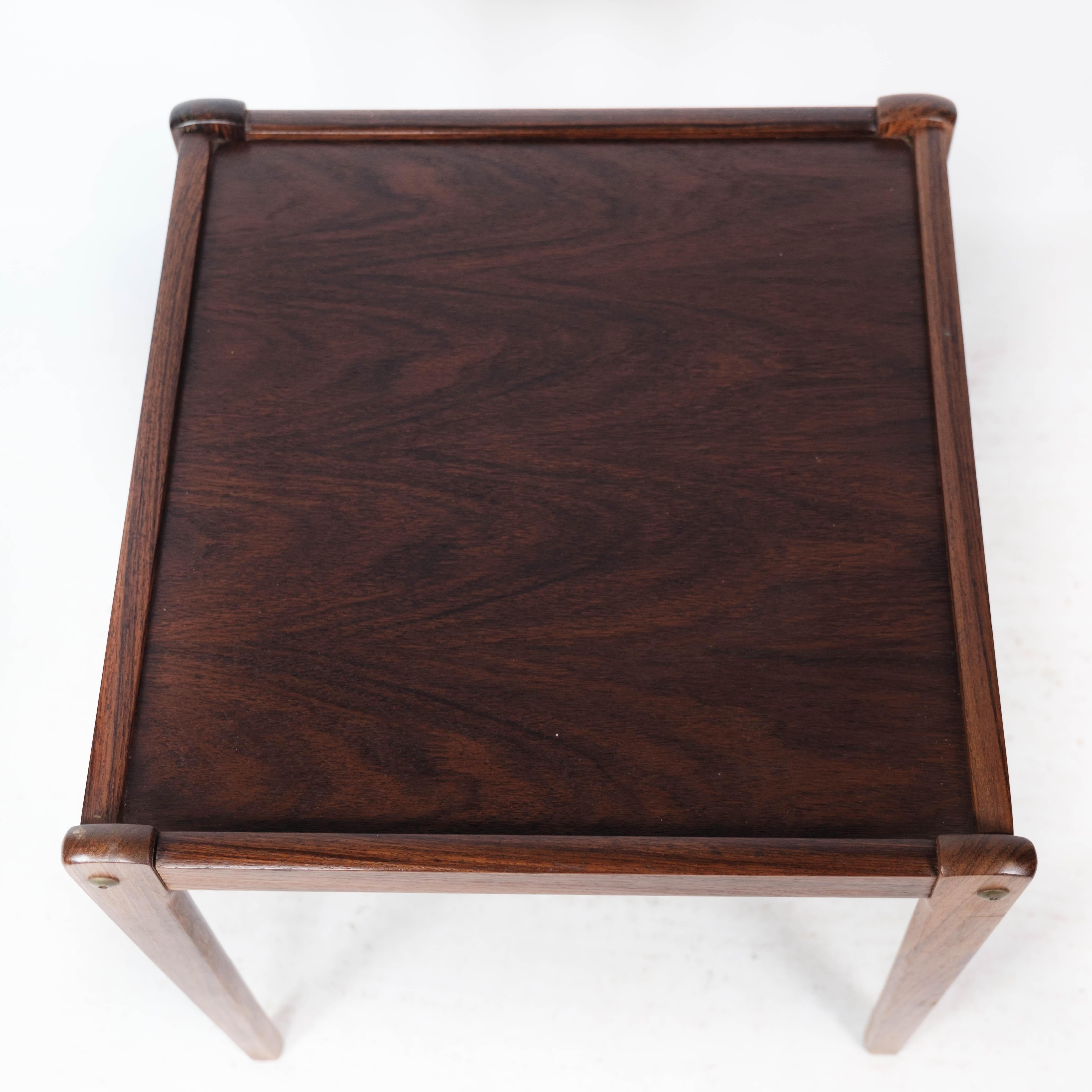 Side table in rosewood of Danish design from the 1960s. The table is in great vintage condition.