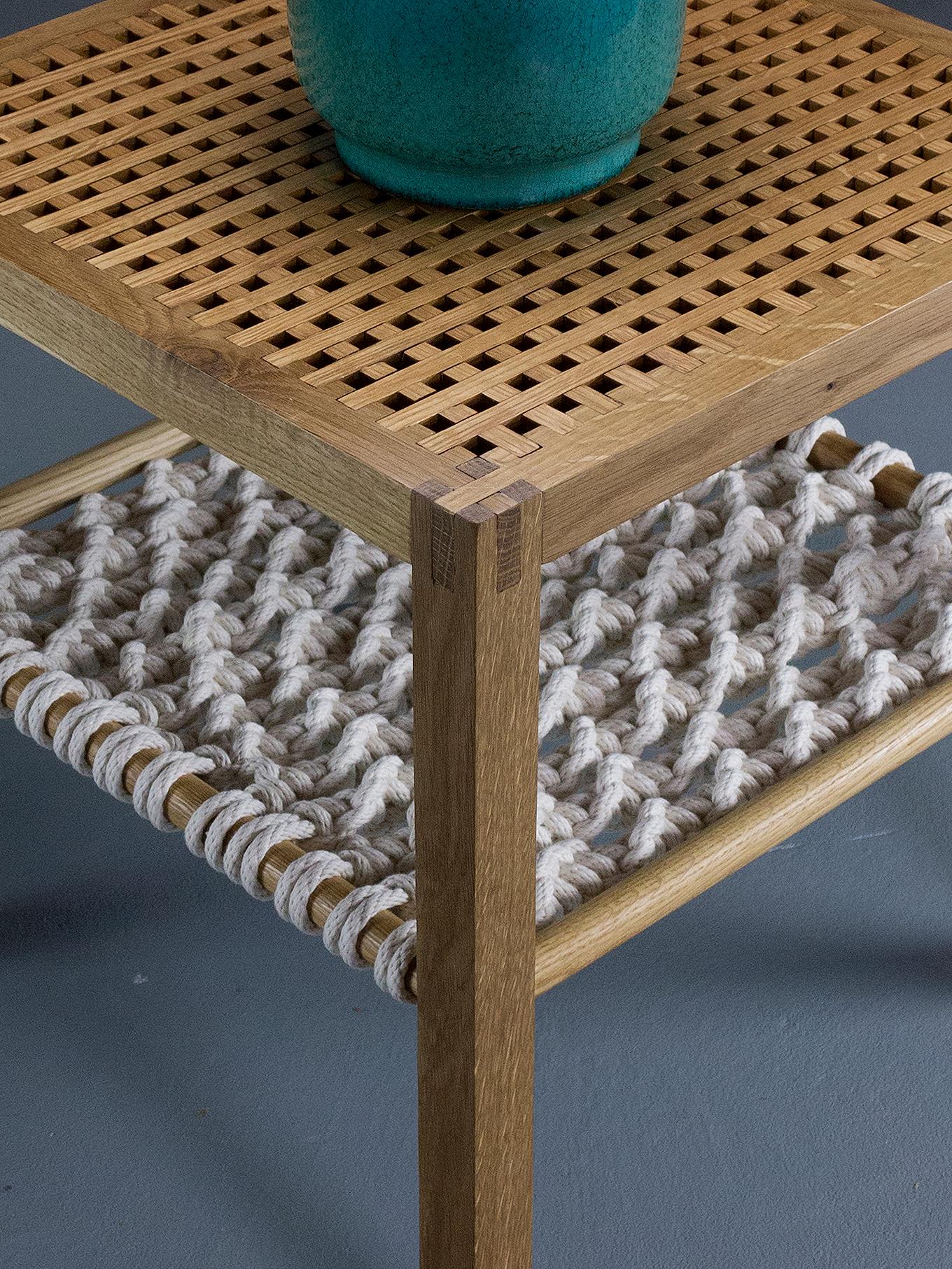 The Macrame Side Table is made of white oak and features a custom macrame shelf by The Knot House. It’s an original design collaboration between Michael Darmanin and Naomi Azuma. 

The grid lattice top is fine enough that mugs, house keys and