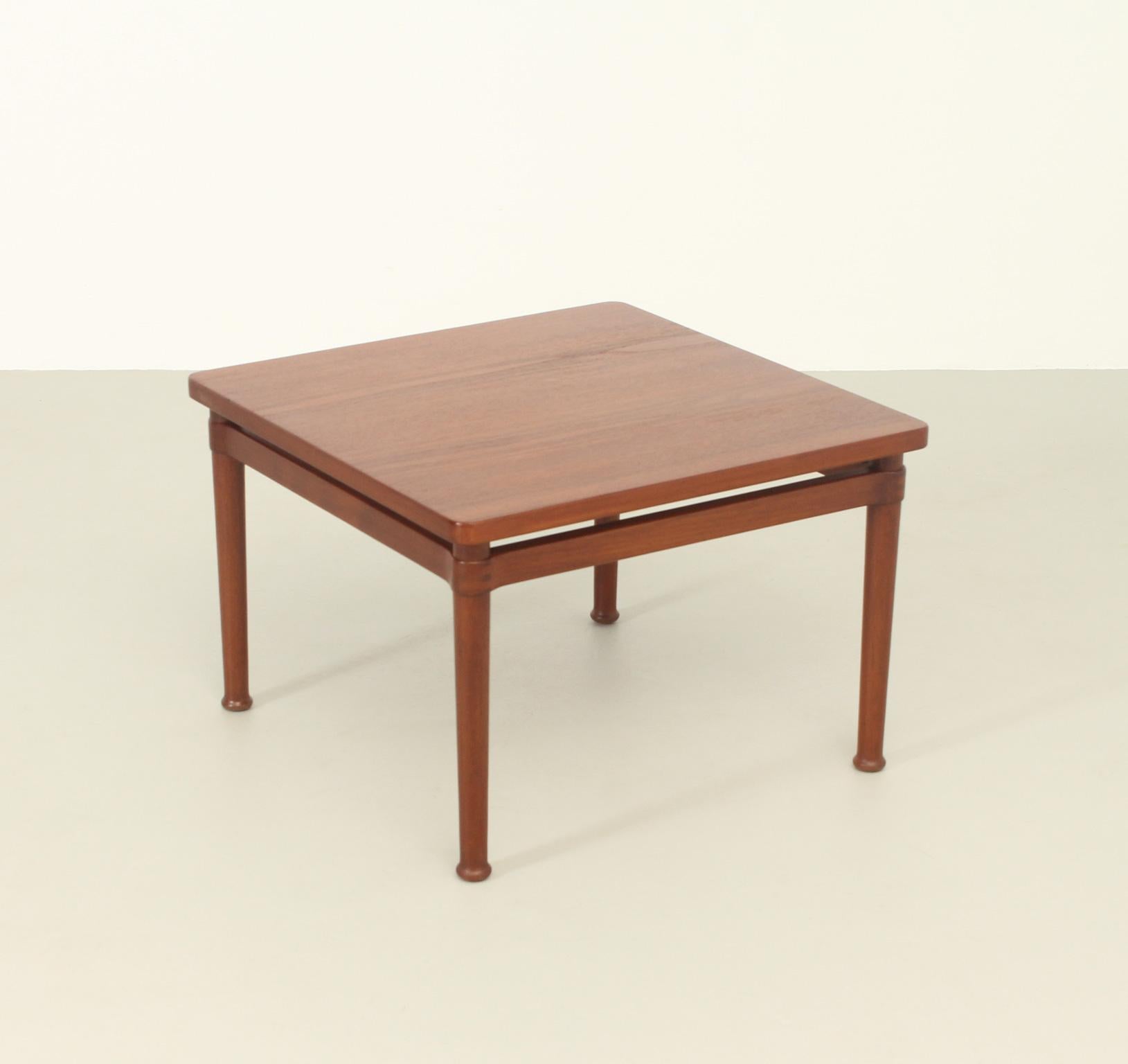 Square side table designed in 1950's by Kai Lyngfeldt Larsen for Søborg Møbler, Denmark. Very rare model in massive teak wood with nice details in the joints.