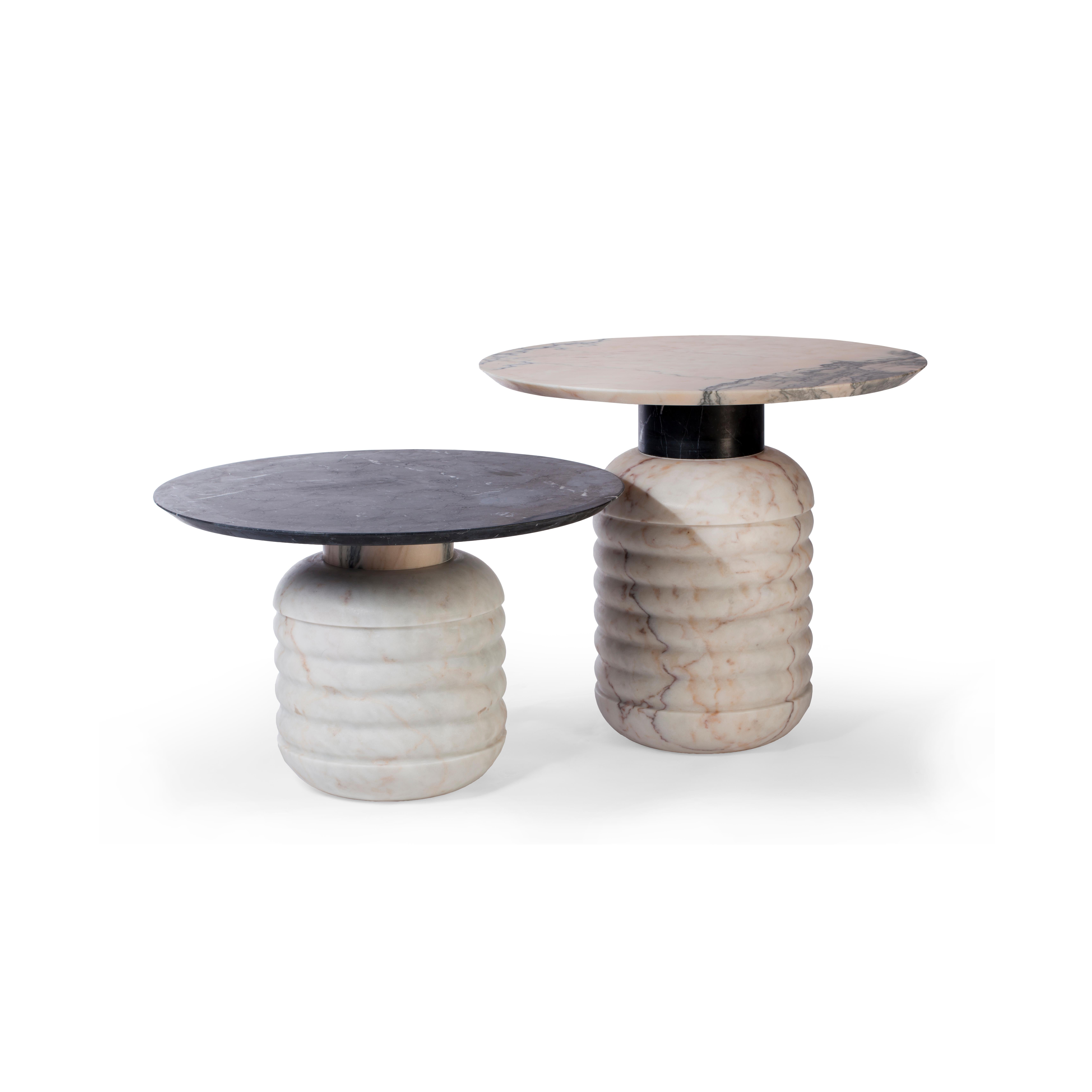 Jean side tables are unique in their conception. The combination of three different marbles make them a sign of unconformity and originality. 
The combination in the picture is in Estremoz white marble, Estremoz pink marble and Nero Marquina marble.