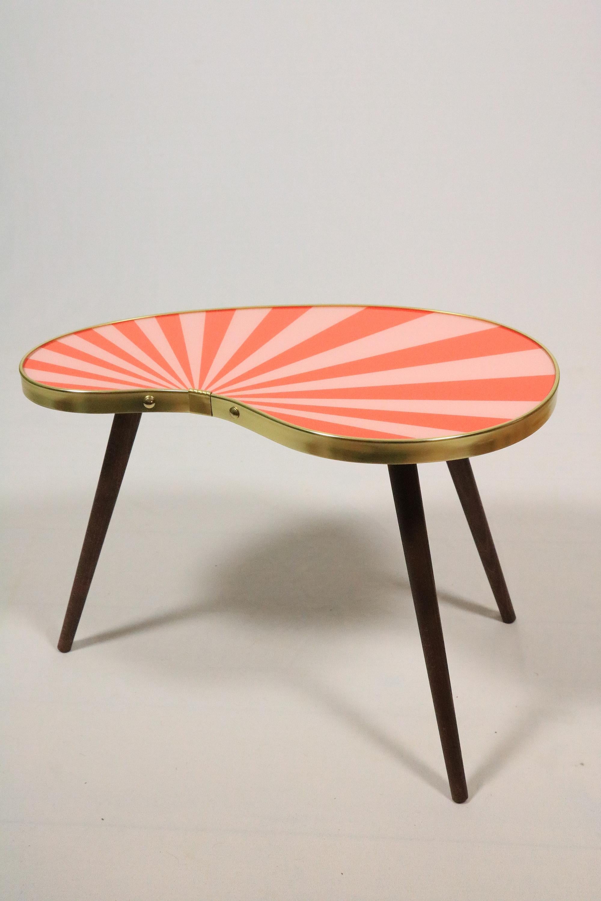 Exclusive offer of one small kidney shaped side table. 
Red-Pink Stripes (see other offers: 4 different colours and patterns avaiable).

These tables are a high-quality new production after original models of the 1950s.

PLEASE note dimensions