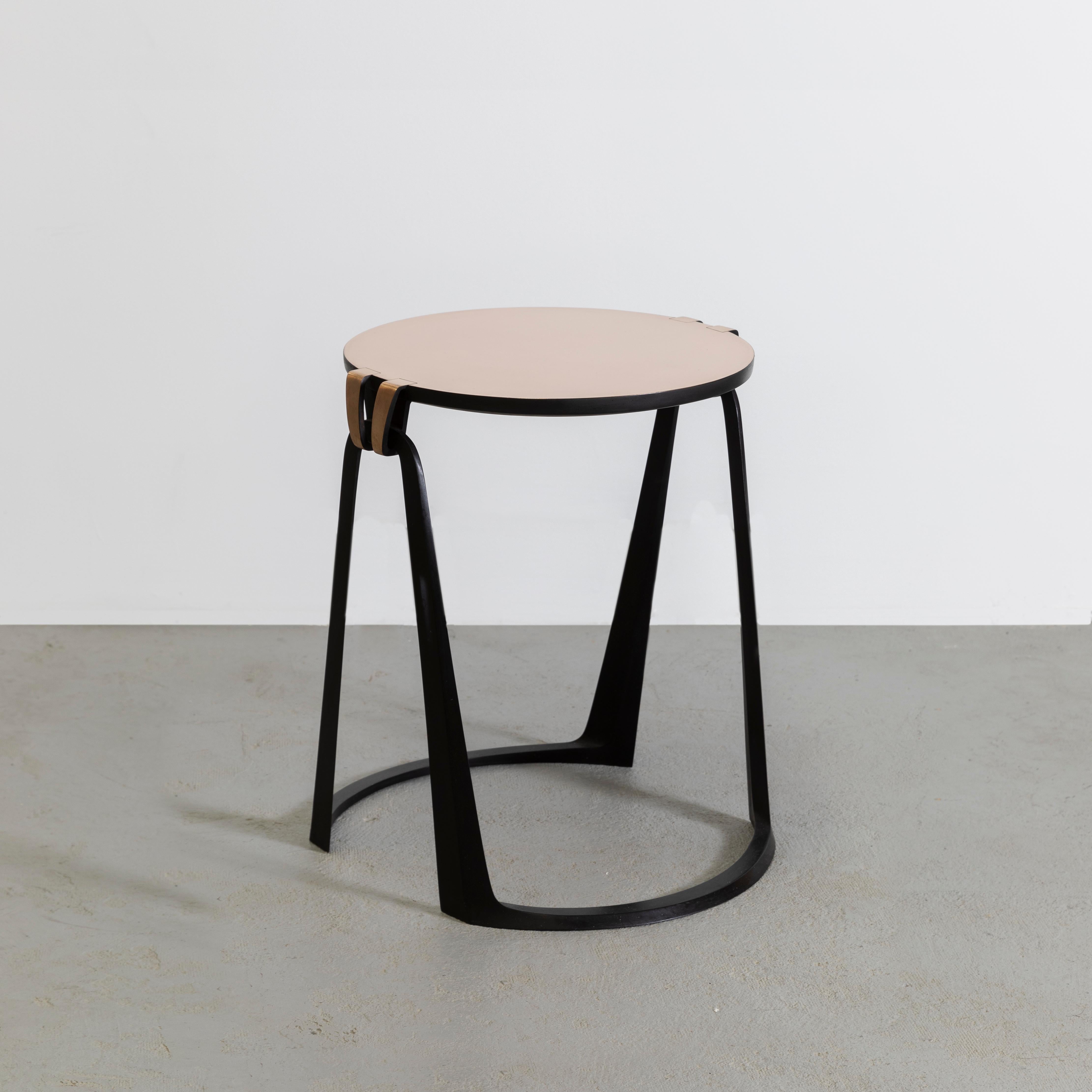 Side table in bronze with a semi-polished top and legs in black patina. 
