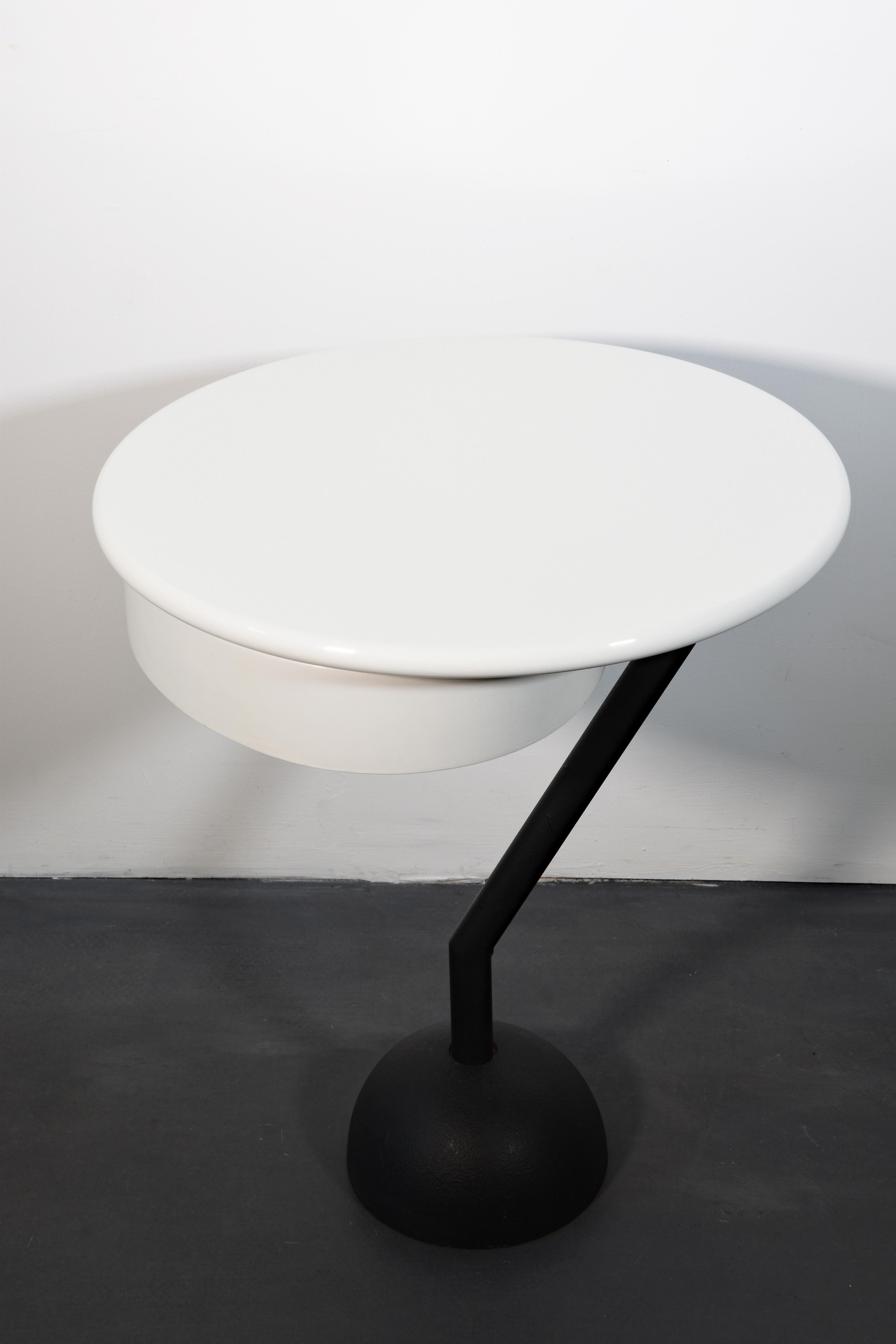 Side table, Memphis, Valerio Mazzei, 1983, Italy. White lacquered.
This table was produced only in small numbers in 1983 prior to the acquisition of Mazzei by Edra. 
This beautiful side table from the Memphis era is in an excellent condition.

