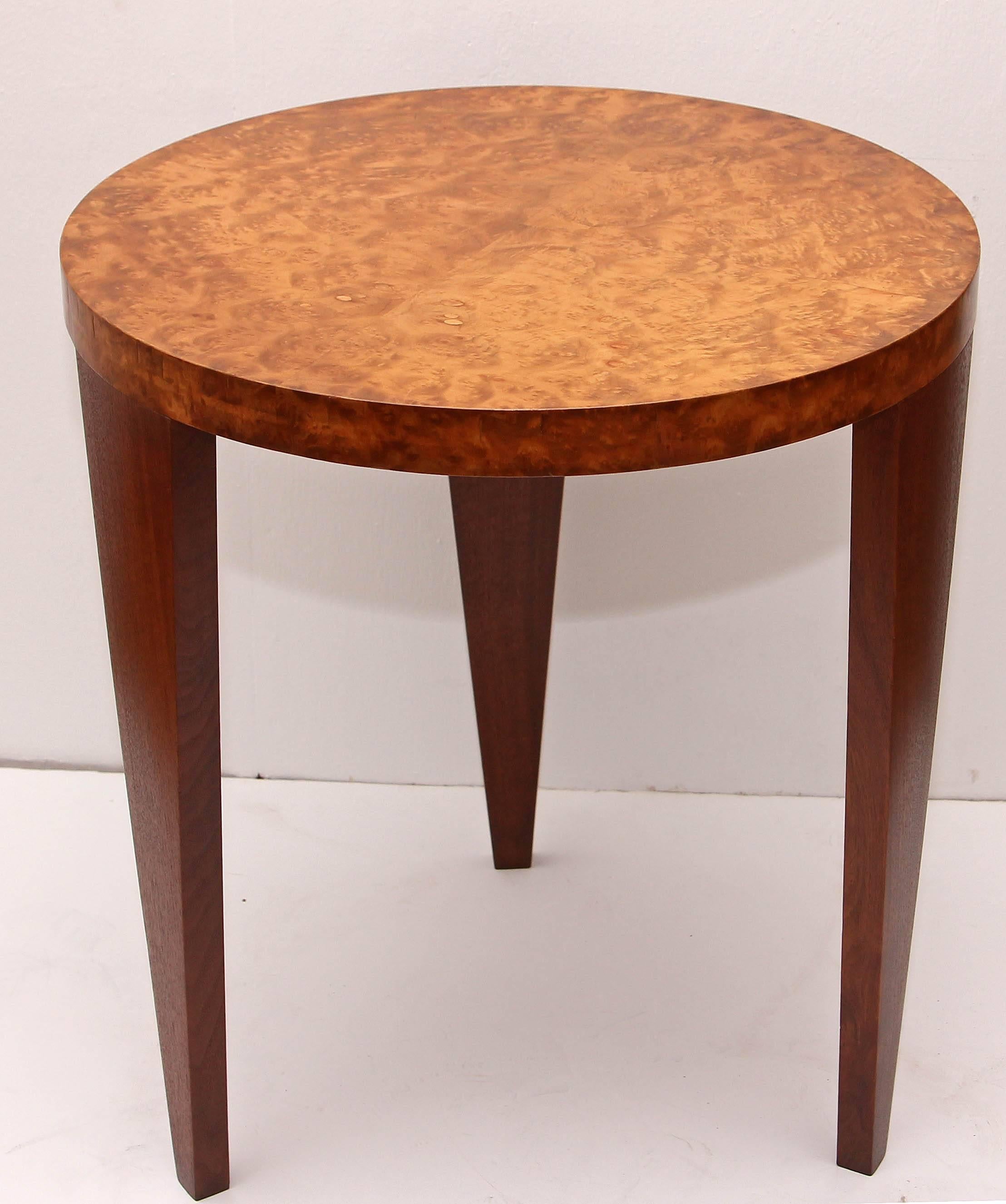 African influenced round side table by master craftsman Andrew Szoeke. Highly figured burled maple top and wenge legs. Szoeke’s work is sought after for it's quality of craftsmanship and use of exotic woods. Provenance: Estate of Thomas
