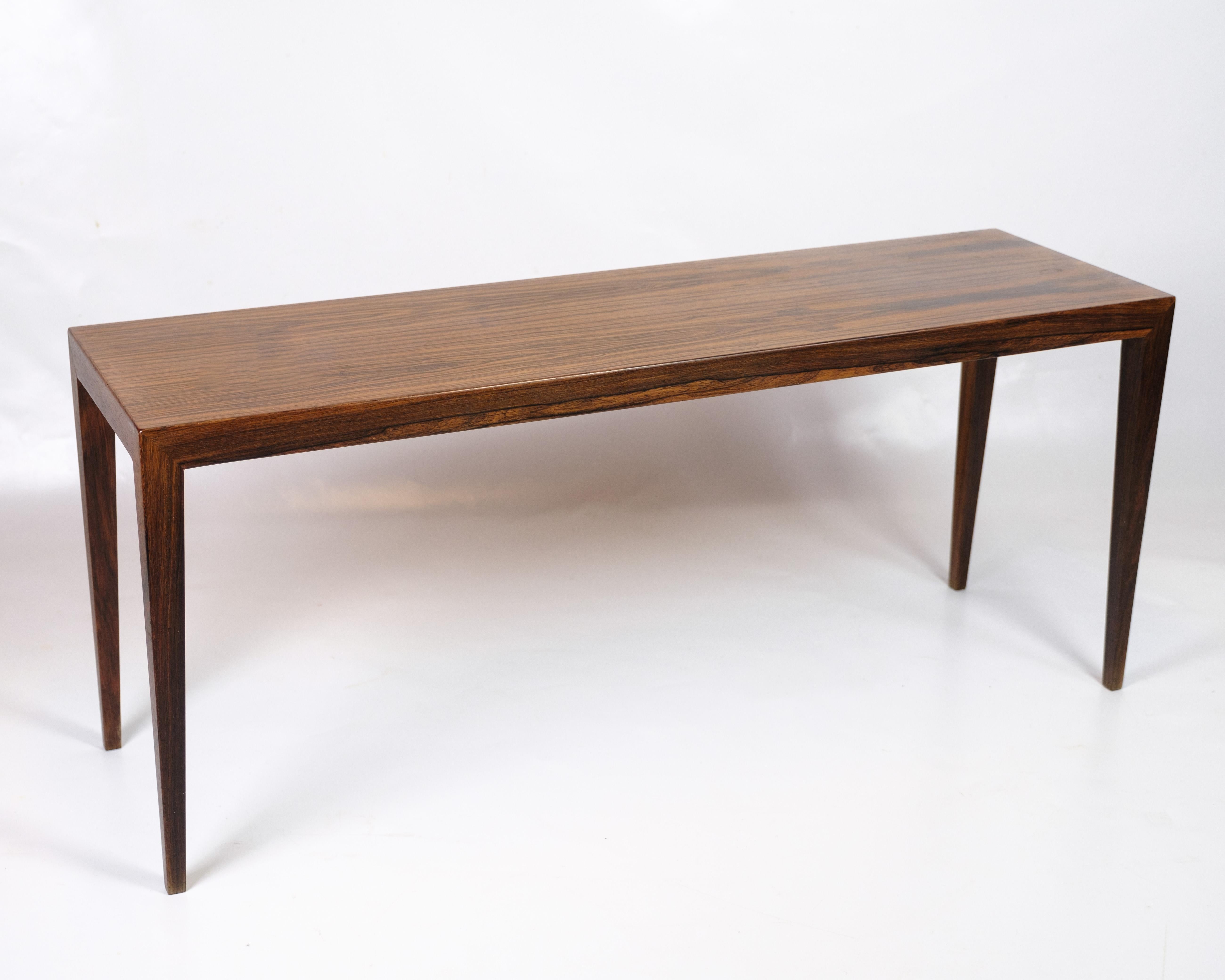 Table d'appoint en bois de rose, modèle 41A, conçue par Severin Hansen et fabriquée par Haslev Møbelfabrik dans les années 1960.

Severin Hansen était un designer de meubles danois connu pour ses meubles élégants et au profil acéré. Ses designs se