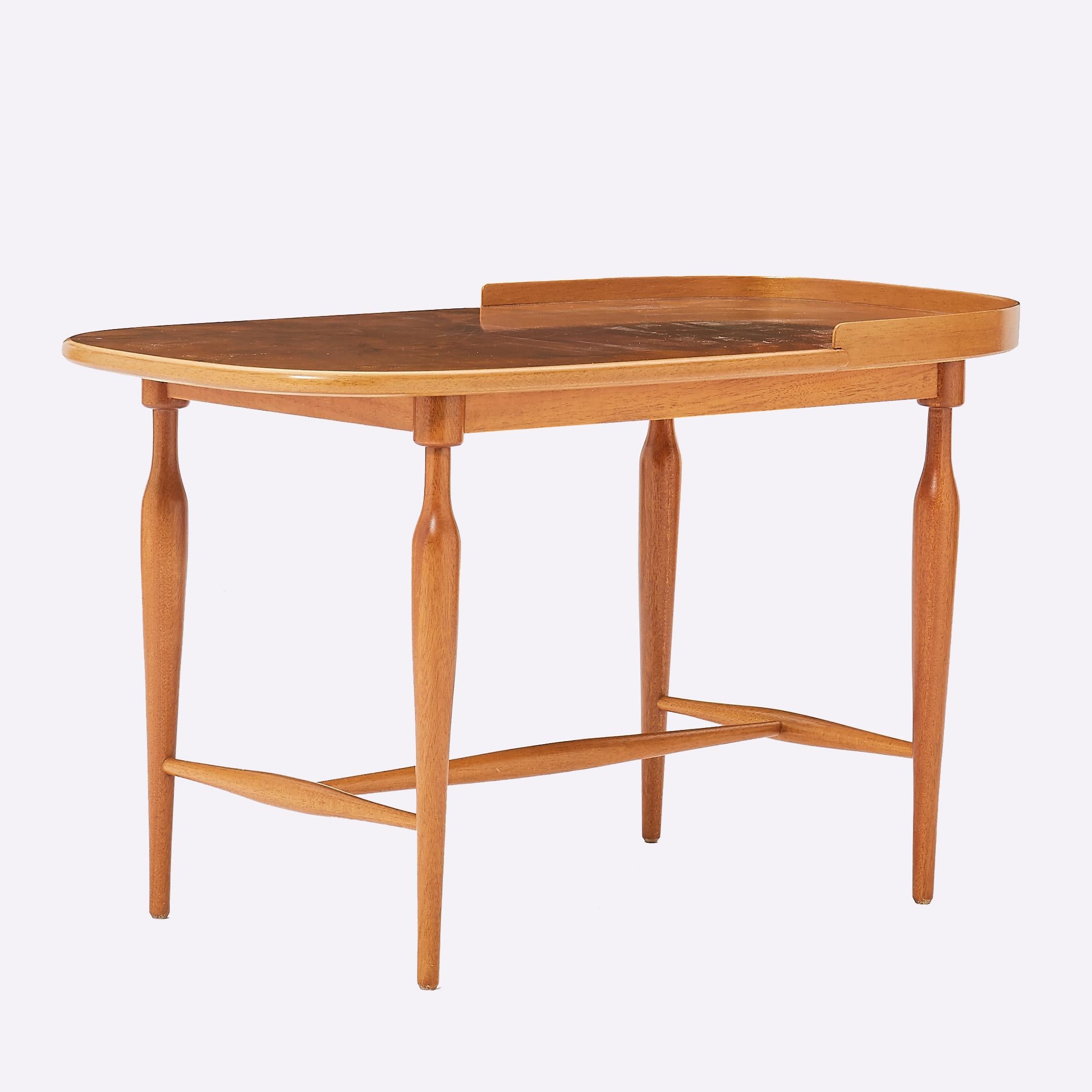 Side table/Occasional model 961 designed by Josef Frank for Svenskt Tenn, Sweden, 1950s. 

Mahogany.