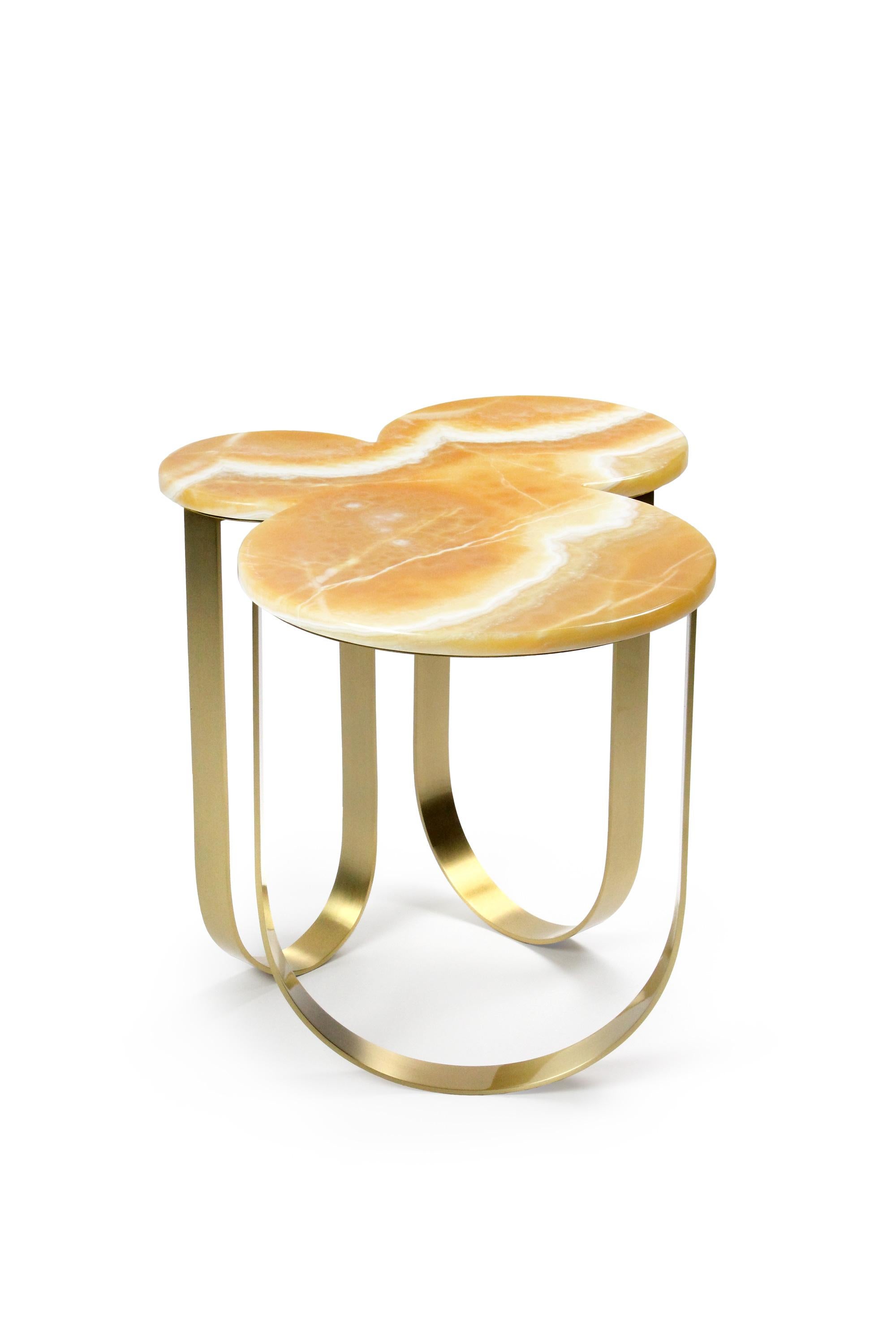 The 'Cloud' is a spectacular side table with structure in brushed brass and top in orange onyx. The brushed finishing of the brass creates interesting reflections of light. 

Dimensions: L 73, W 54, H 50 cm

Limited Edition of 45. 

Each side table