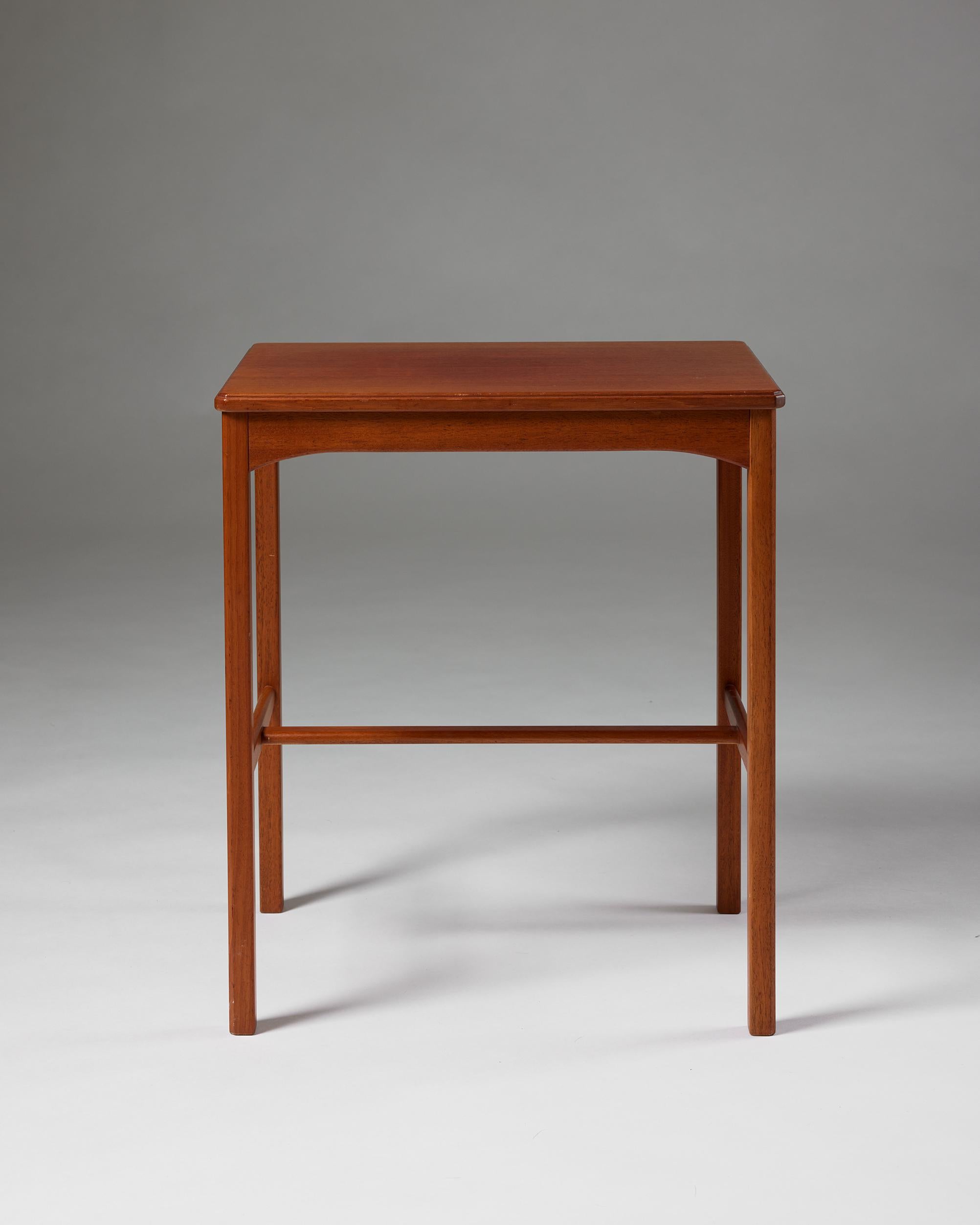 Swedish Side table ‘October’ designed by Carl Malmsten, Sweden, 1930s, walnut For Sale