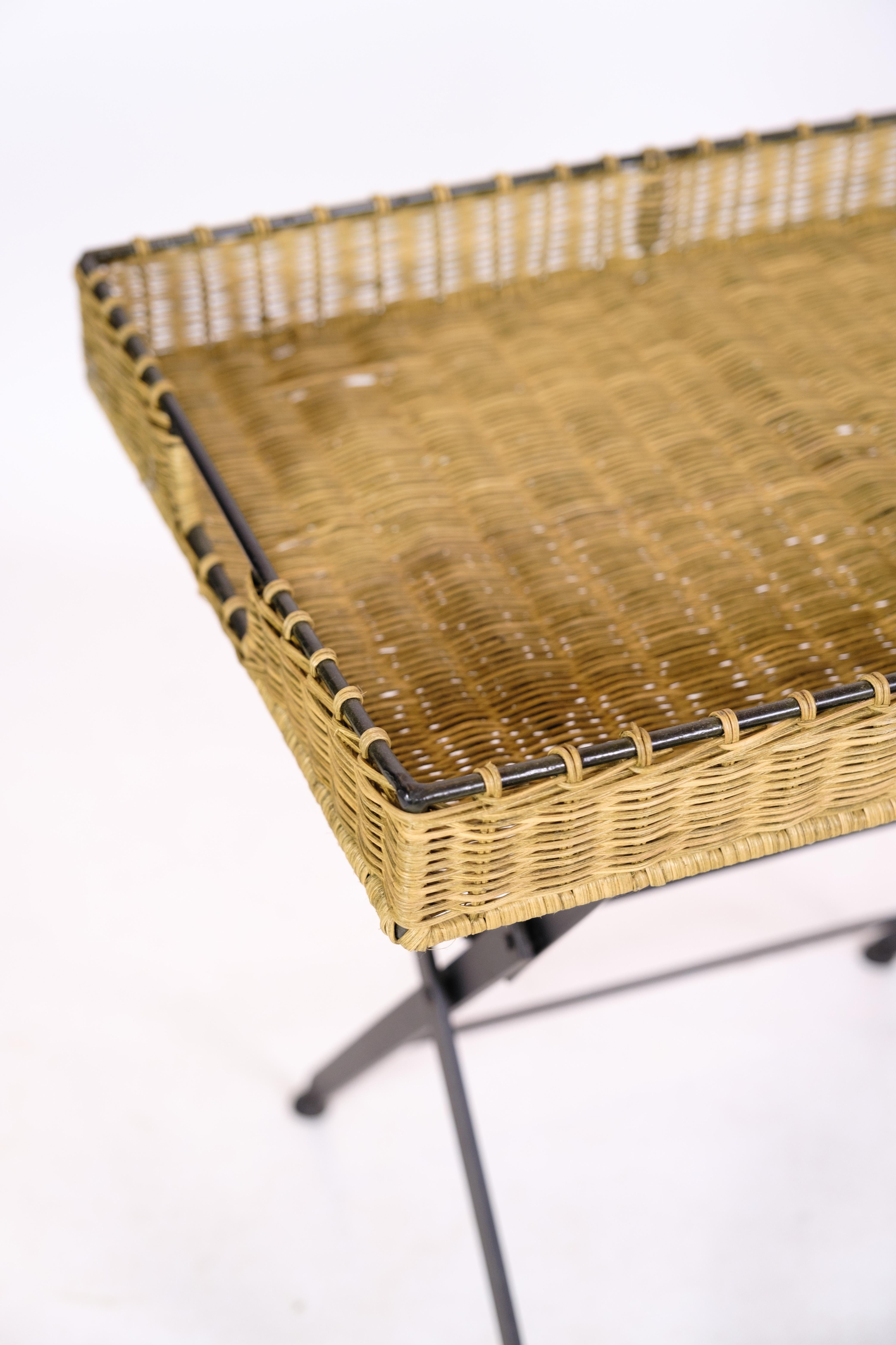 Side table with wicker tray and metal legs is particularly suitable for a console table or flower table on the balcony from around the 1970s
Measurements in cm: H:57.5 W:56 D:40