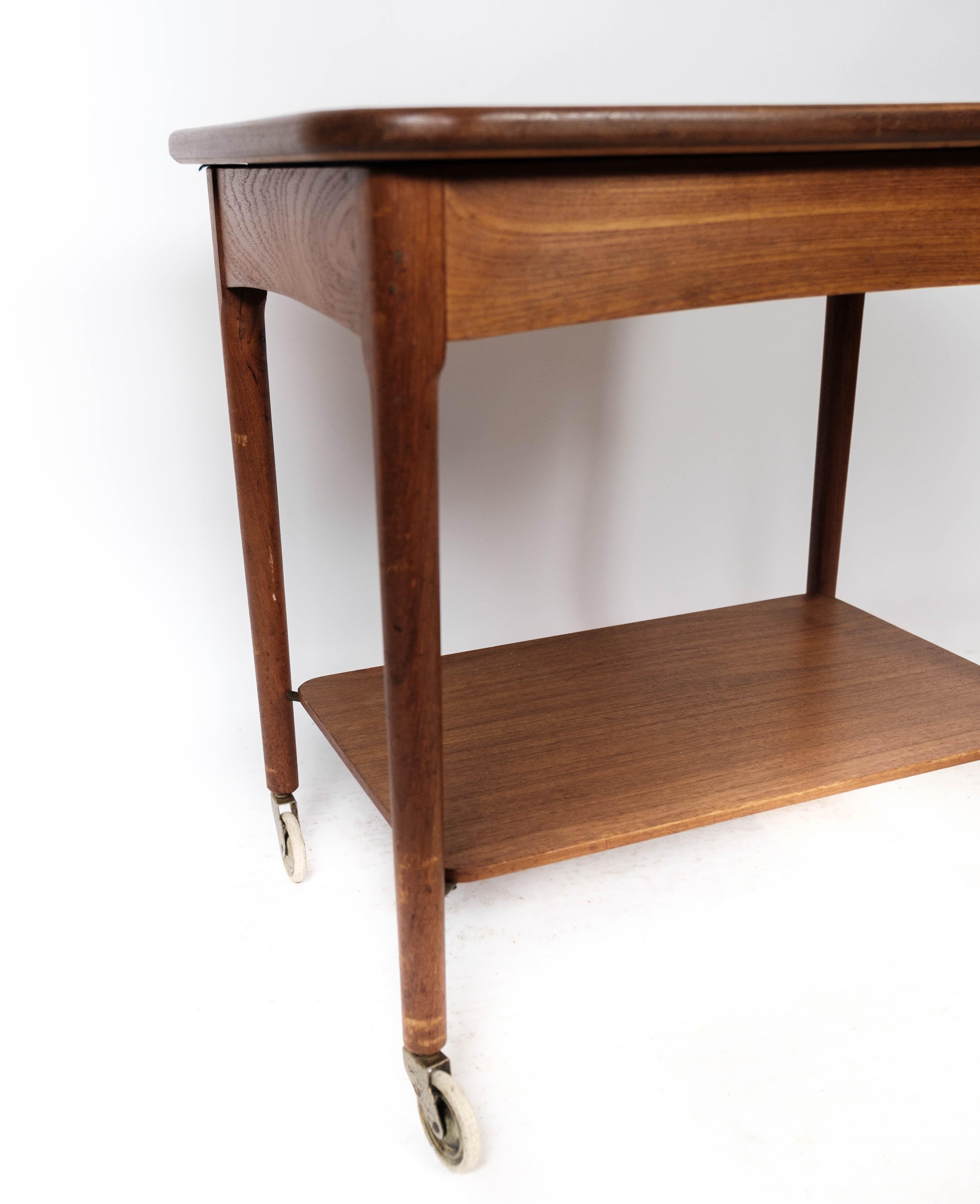 Mid-Century Modern Side Table On Wheels Made In Teak Of Danish Design From 1960s For Sale