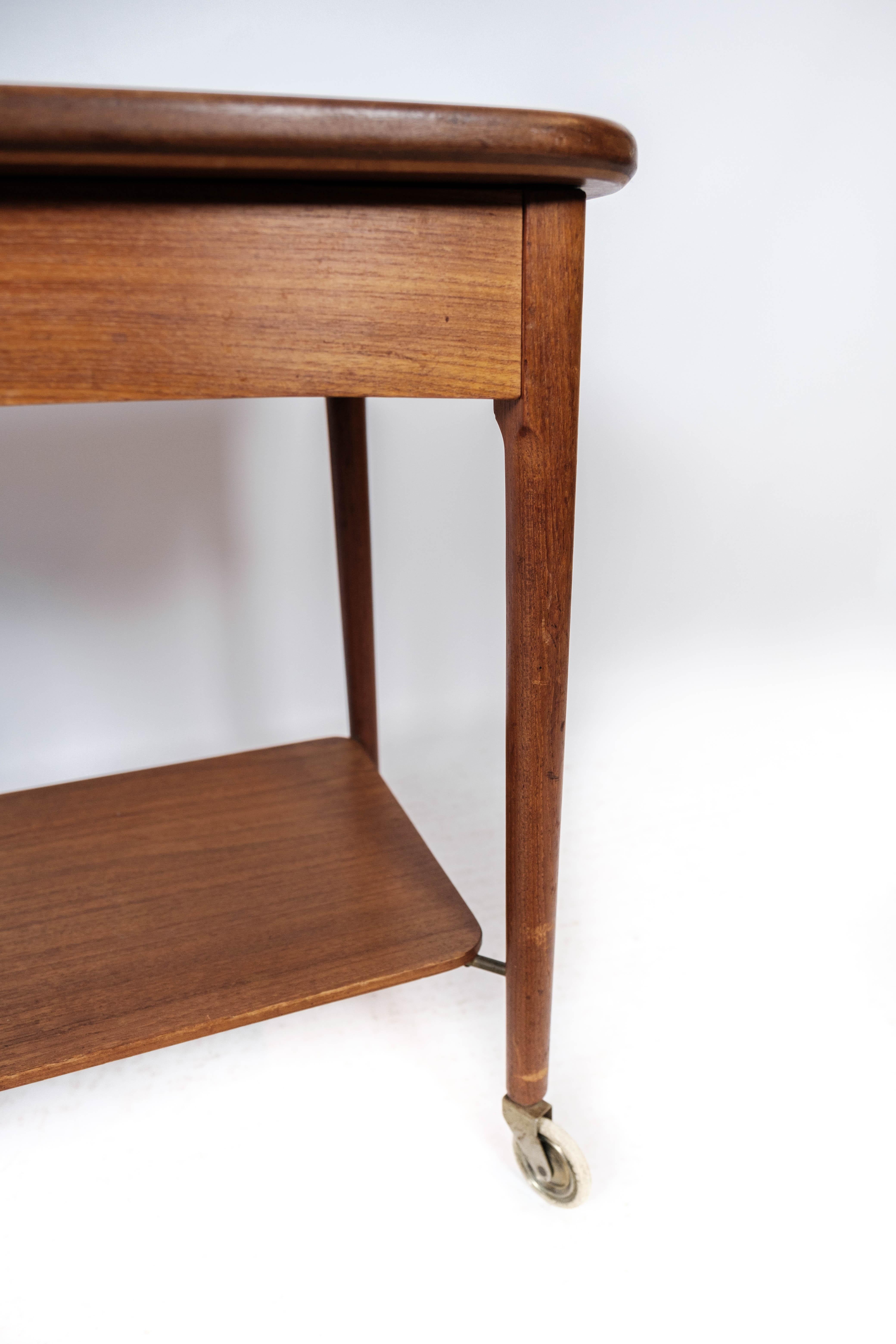 Mid-20th Century Side Table On Wheels Made In Teak Of Danish Design From 1960s For Sale