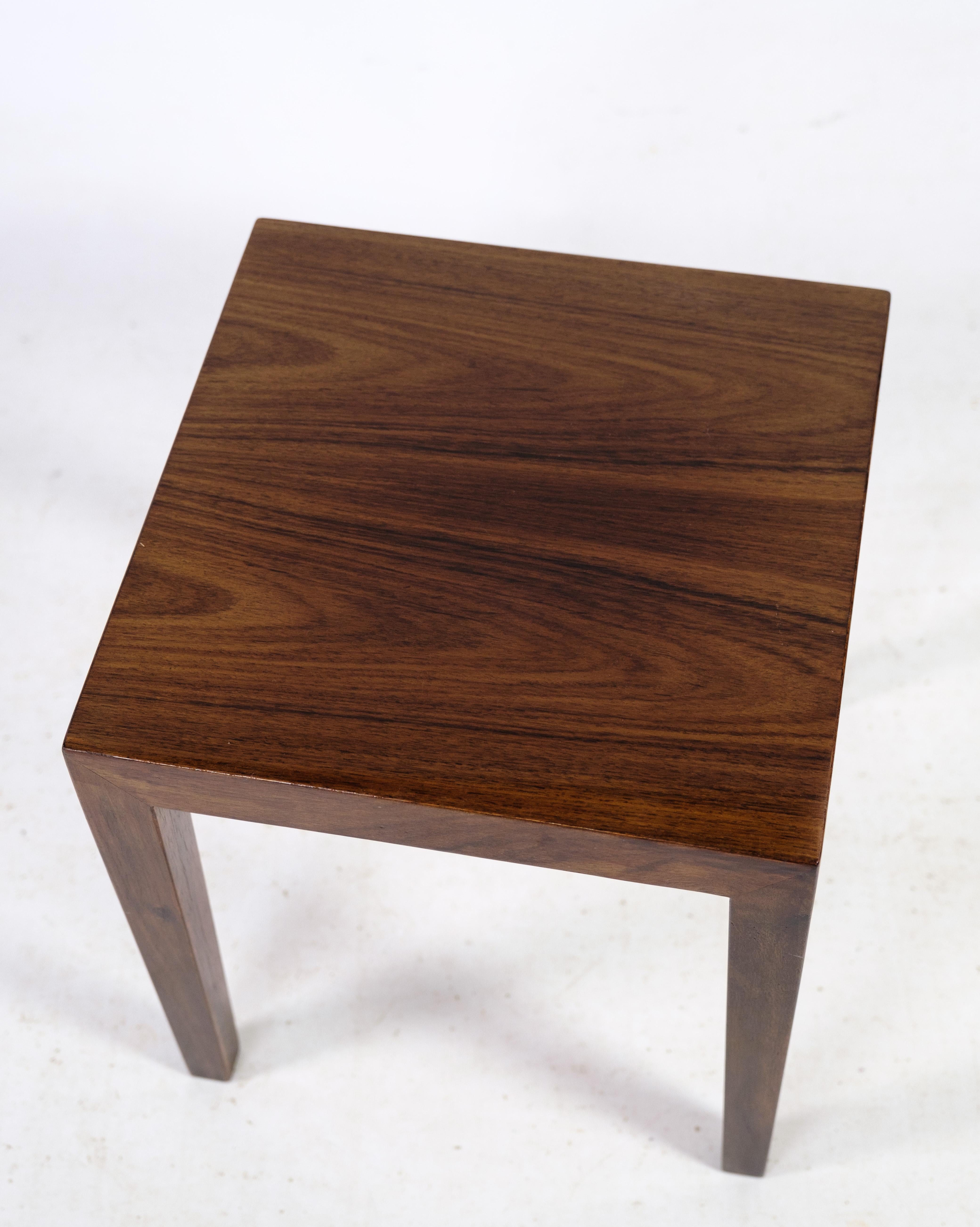 This small side table in rosewood, designed by the renowned Severin Hansen and manufactured by Haslev Møbelfabrik around the 1960s, epitomizes the elegance and craftsmanship of Danish design.

Severin Hansen's keen eye for detail is showcased in the