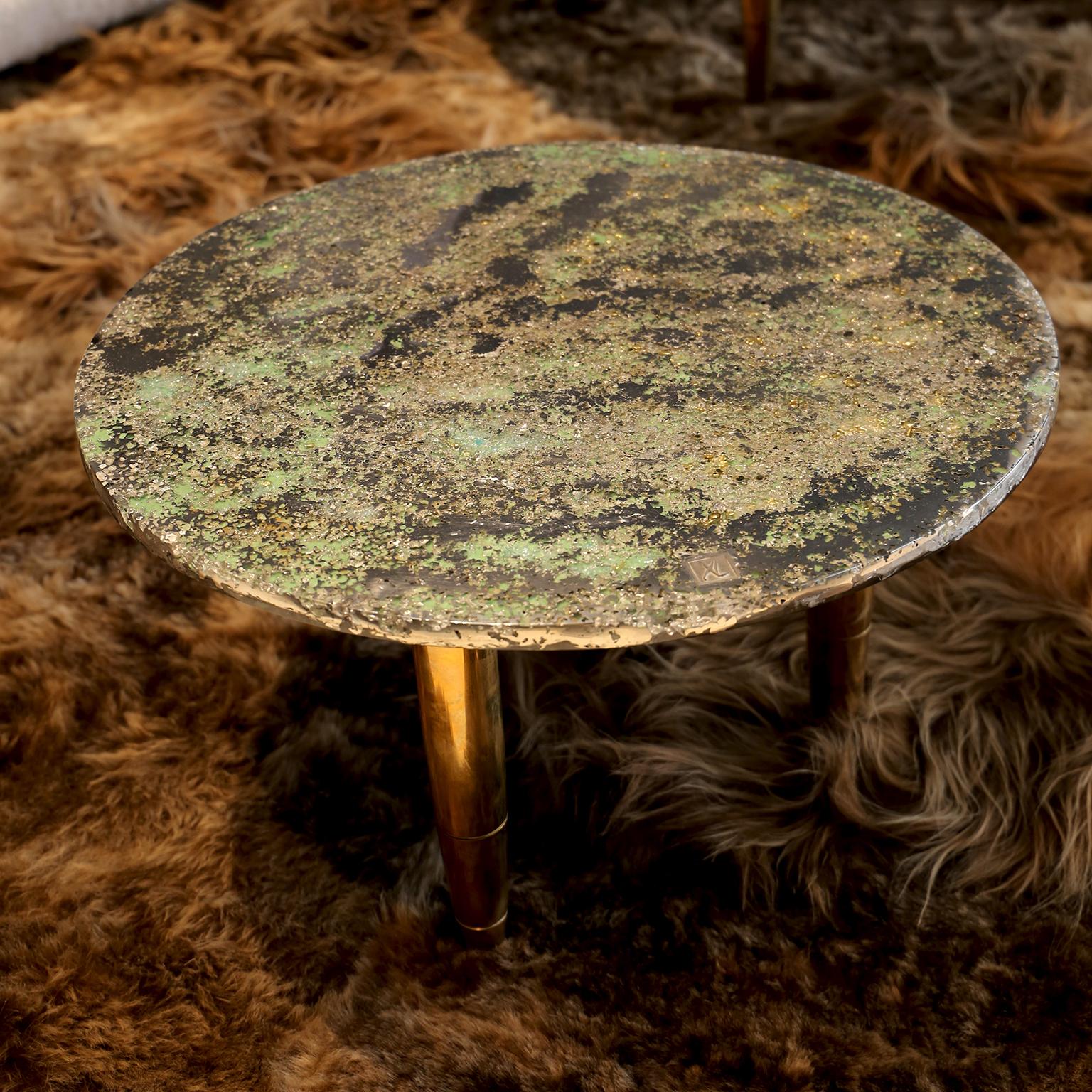 This contemporary coffee table is a unique piece, created by Xavier Lavergne and made of melted pewter with Venice Murano glass, embedded in resin and polished like a marble. The table is handmade in France. Each piece is unique and sold with