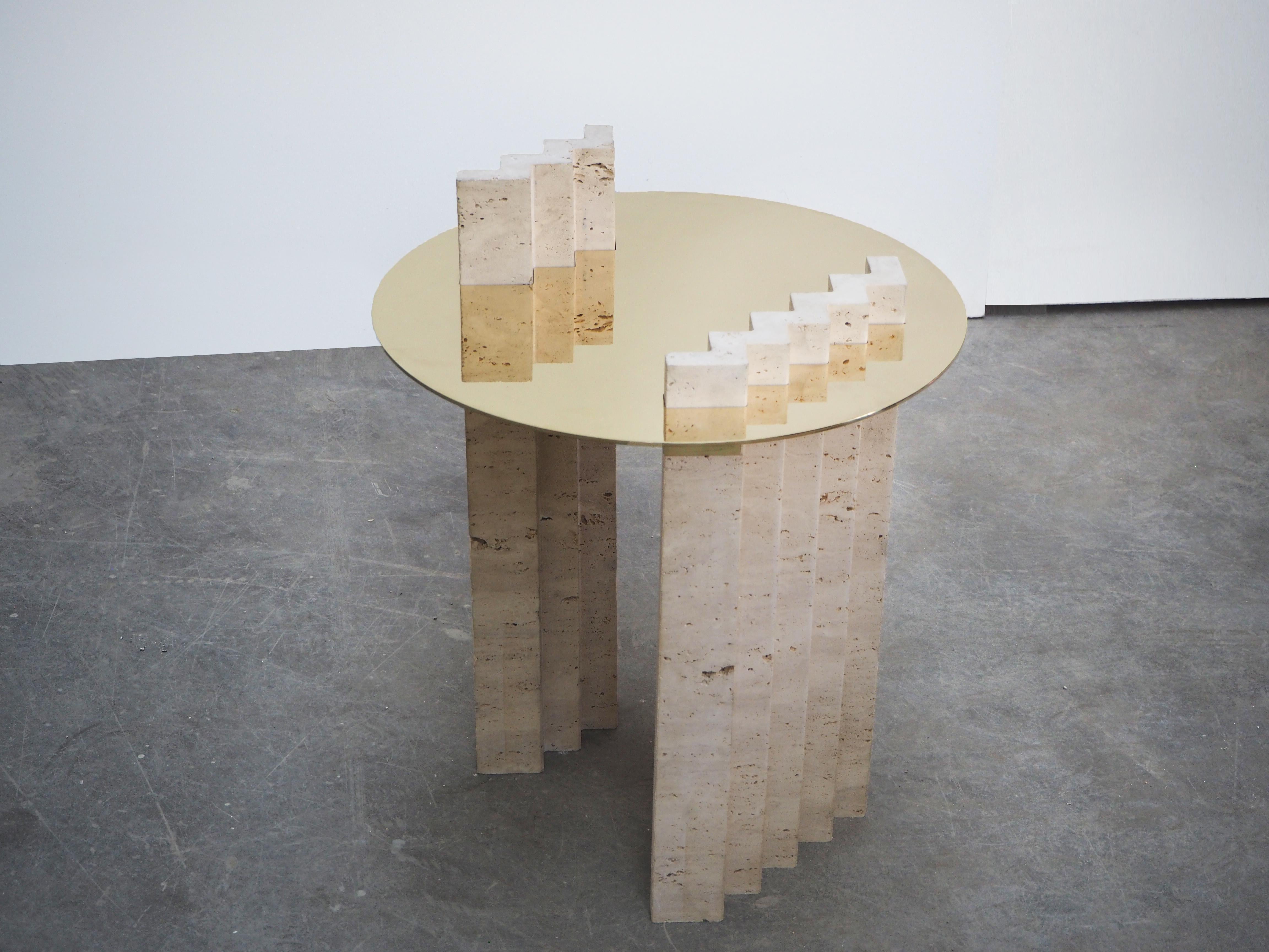 Side table travertine and brass sculpted by Dessislava Madanska.
One design space.
Sculpted side table.
Dimensions: W 50 x D 50 x H 60 cm.
Materials: travertine and polished brass.
A limited edition of 12 pieces + 4 A.P.

Dessislava Madanska