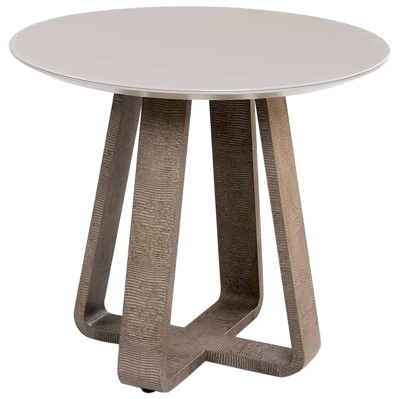 A Small Geometric Side Table with Fitted Antique Black and Gold Glass