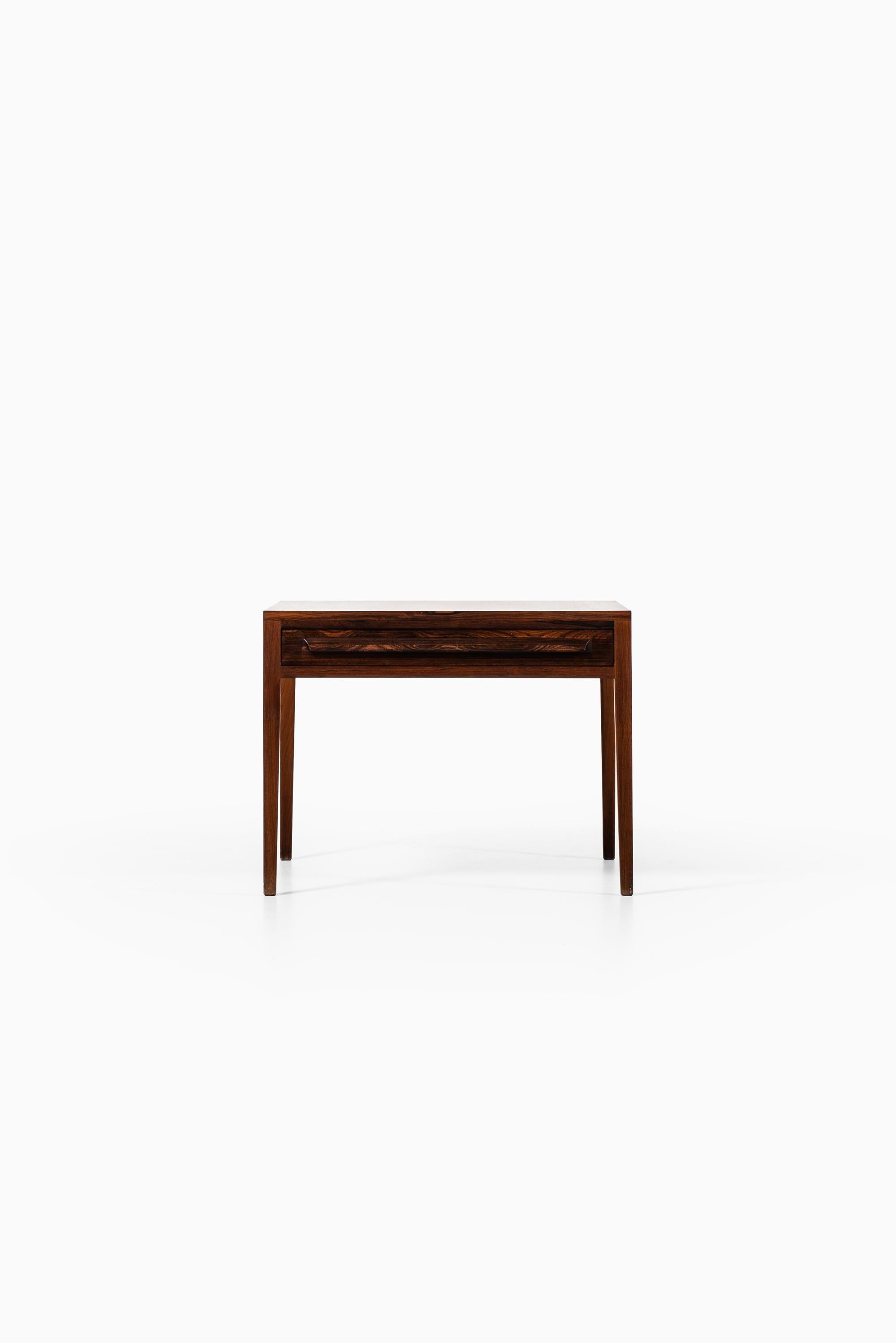 Rare side table with drawer in rosewood. Produced by O.P. Rykken & Co Møbelfabrikk in Norway.