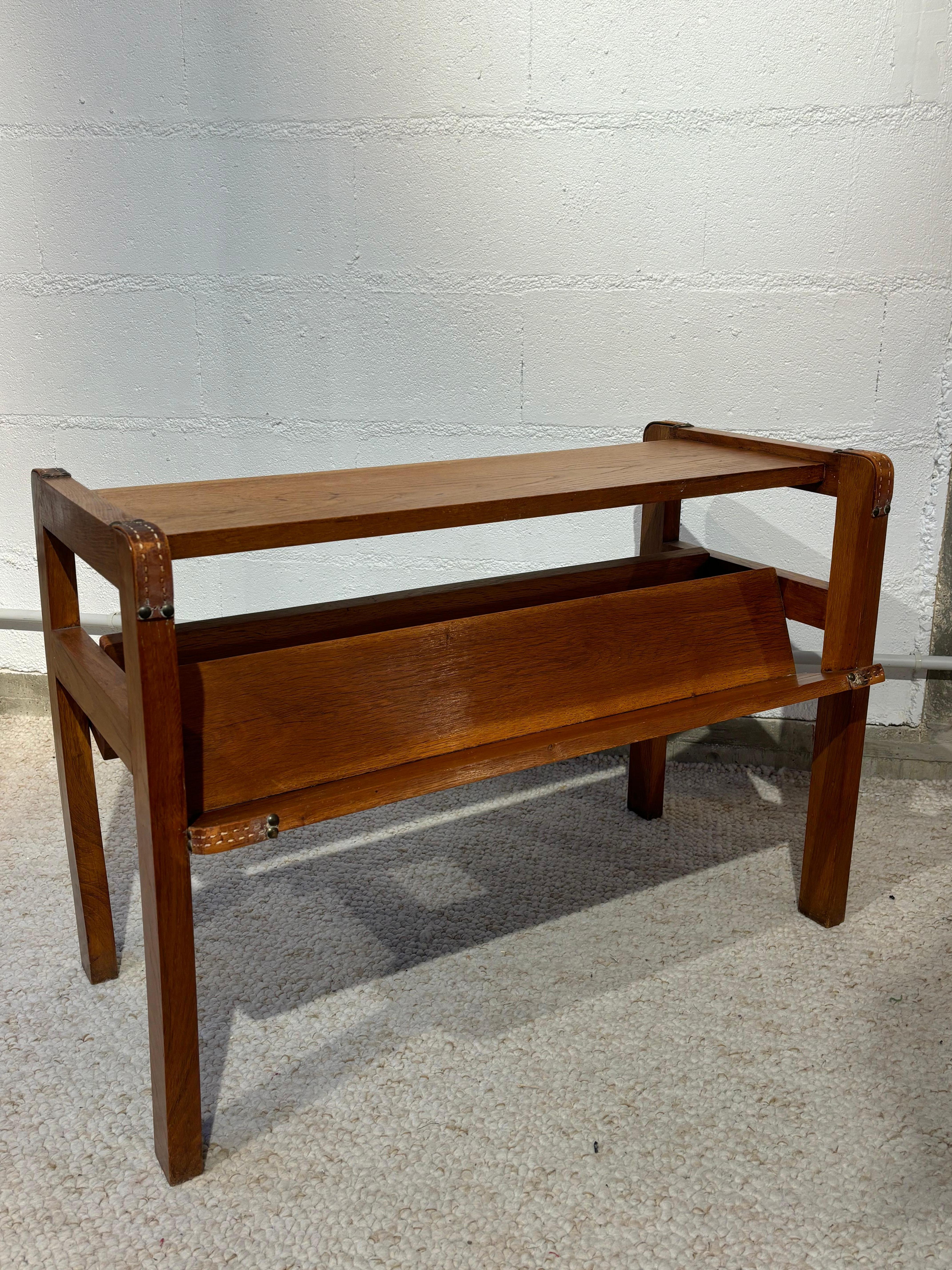 Cuir Side table with rack by Jacques Adnet en vente