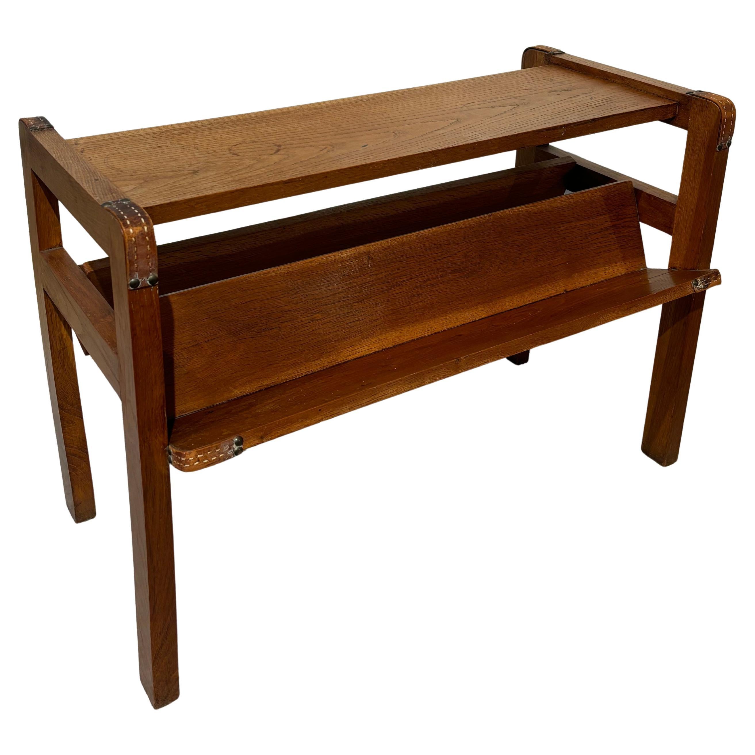 Side table with rack by Jacques Adnet en vente