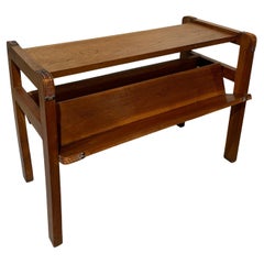 Side table with rack by Jacques Adnet