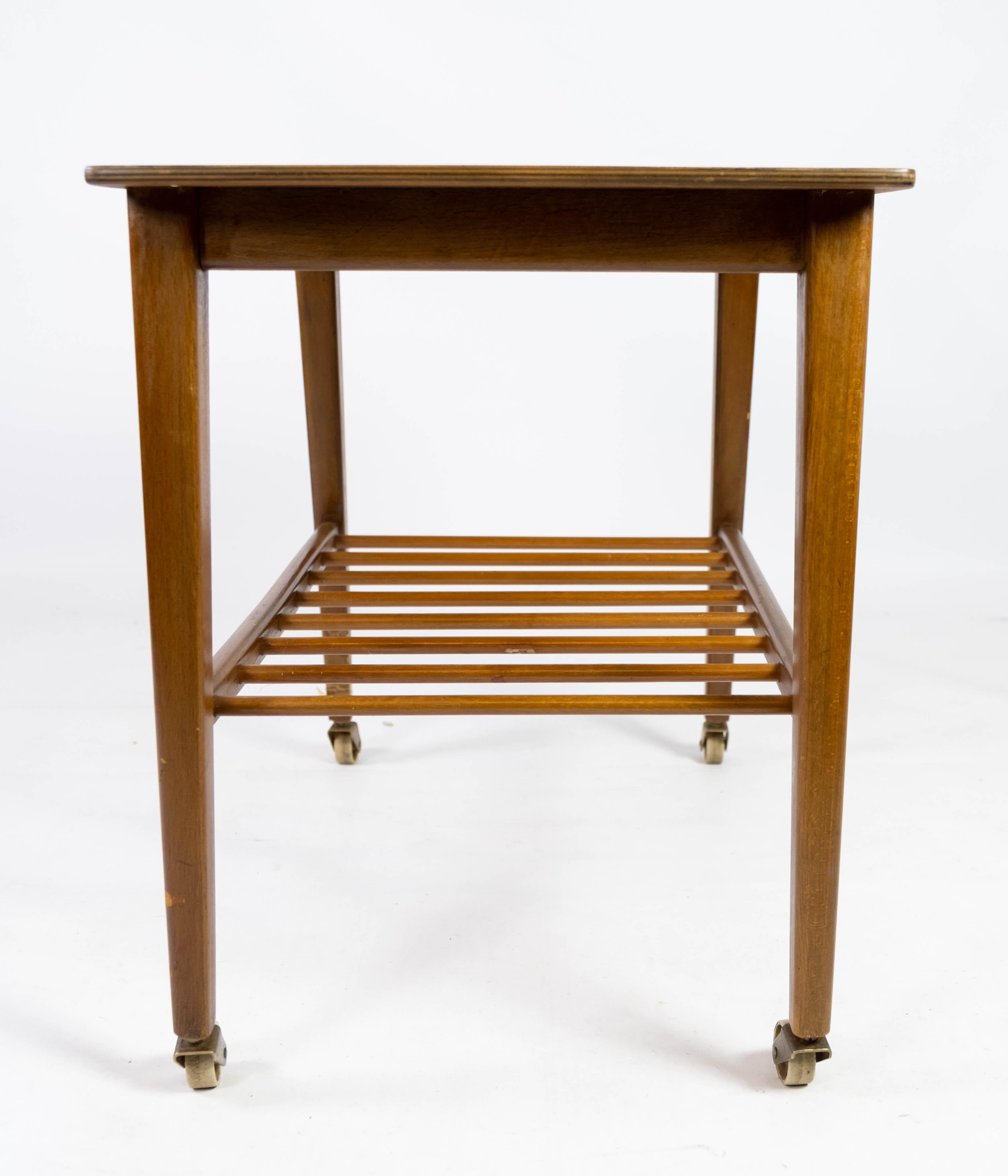 Mid-20th Century Side Table With Shelf & On Wheels Made In Teak, Danish Design From 1960s For Sale