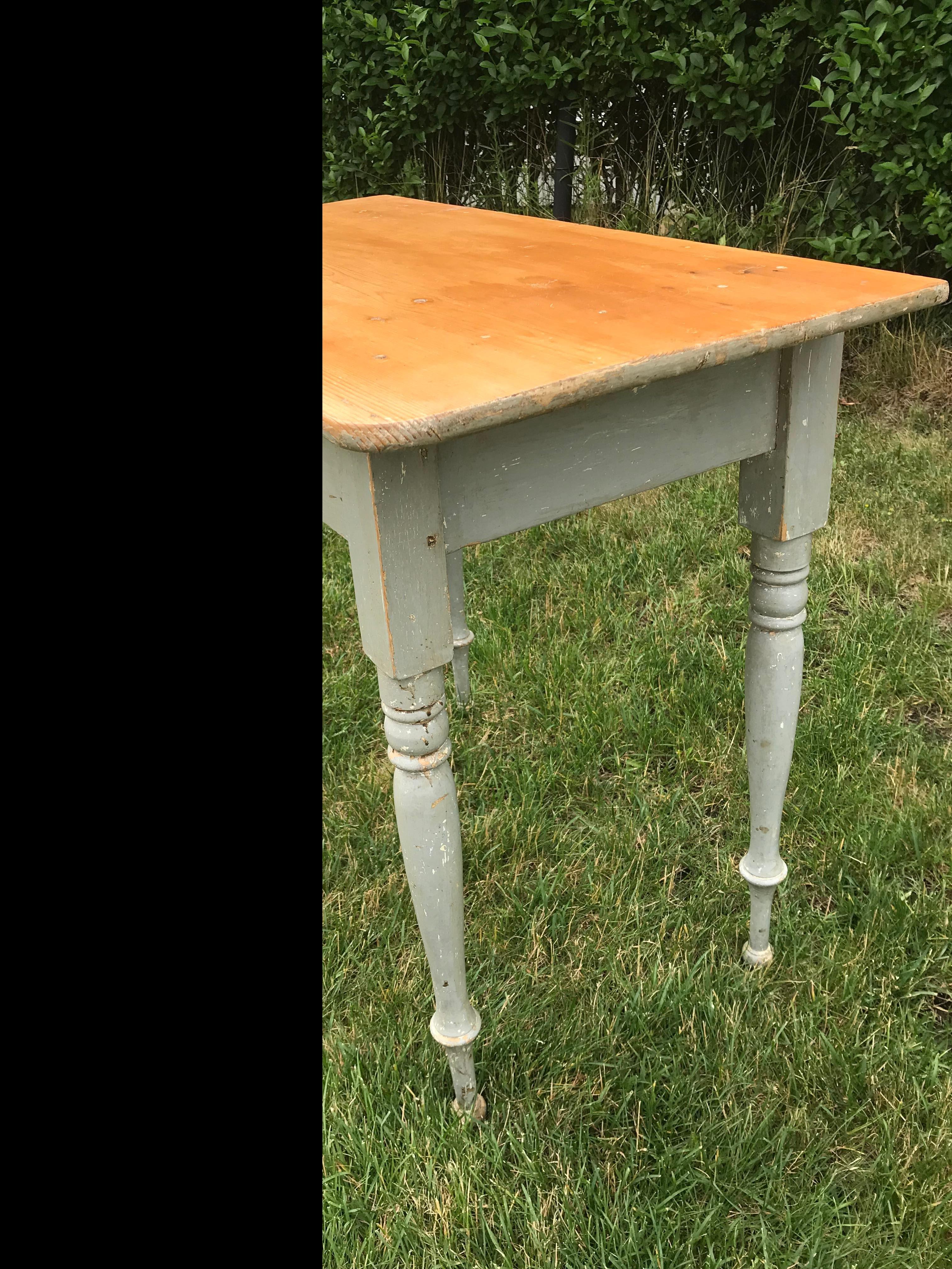 vintage table featuring turned legs