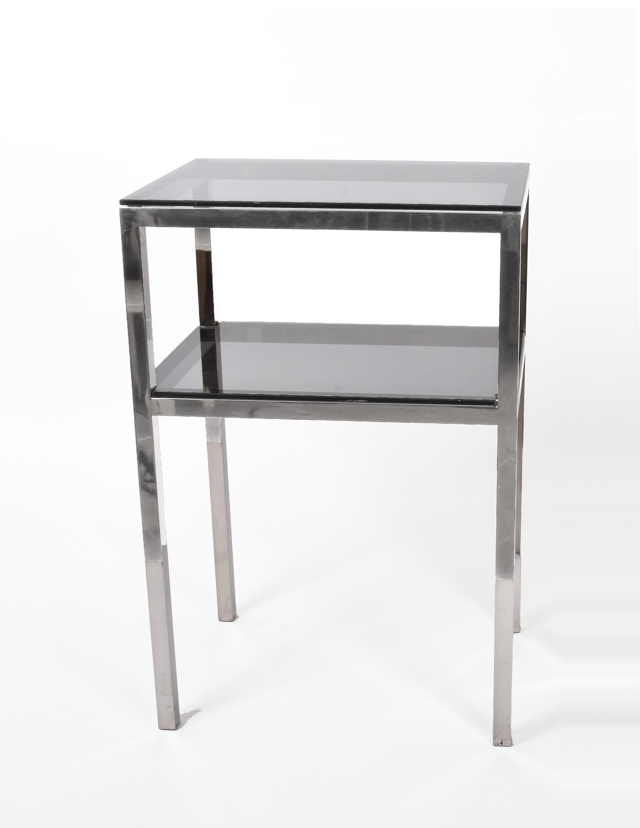 Side table with two levels steel and smoked glass. After Romeo Rega, Italy 1980s
Chrome and smoked glass.
