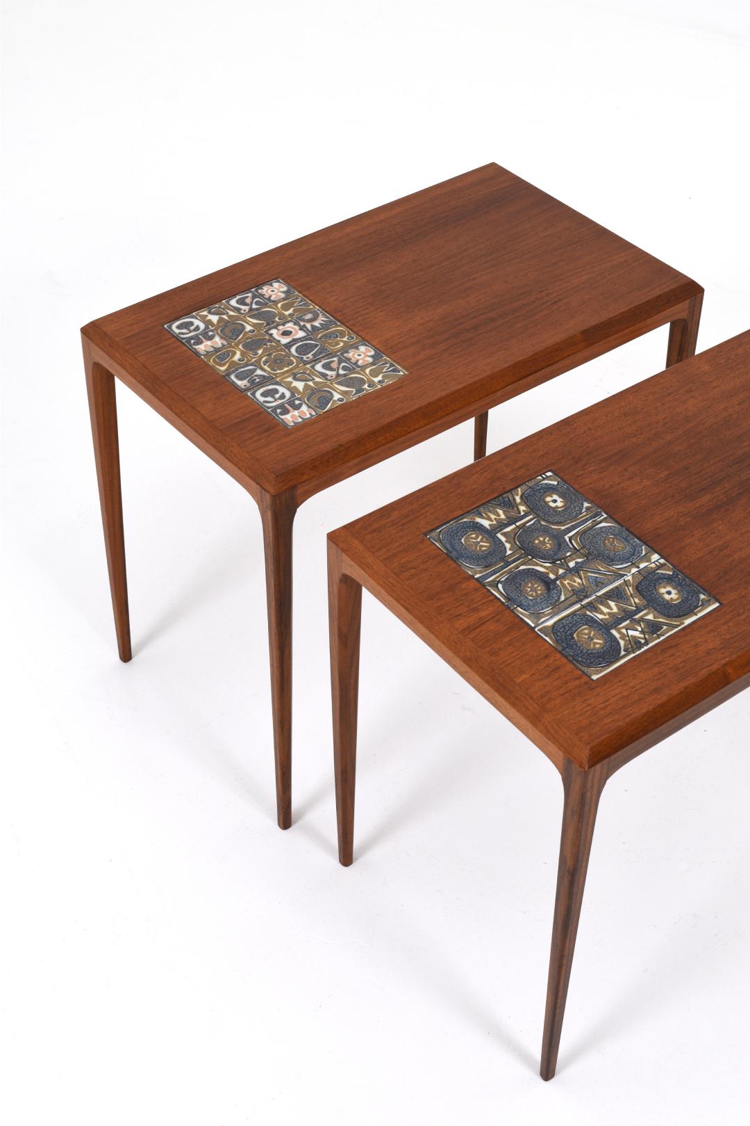 Two small side tables designed by Severin Hansen with ceramics by Nils Thorsson, Royal Copenhagen for Haslev, Denmark.

Nice side table that can be used as a bedside table or relief table next to the sofa or favorite armchair. The tables are made of