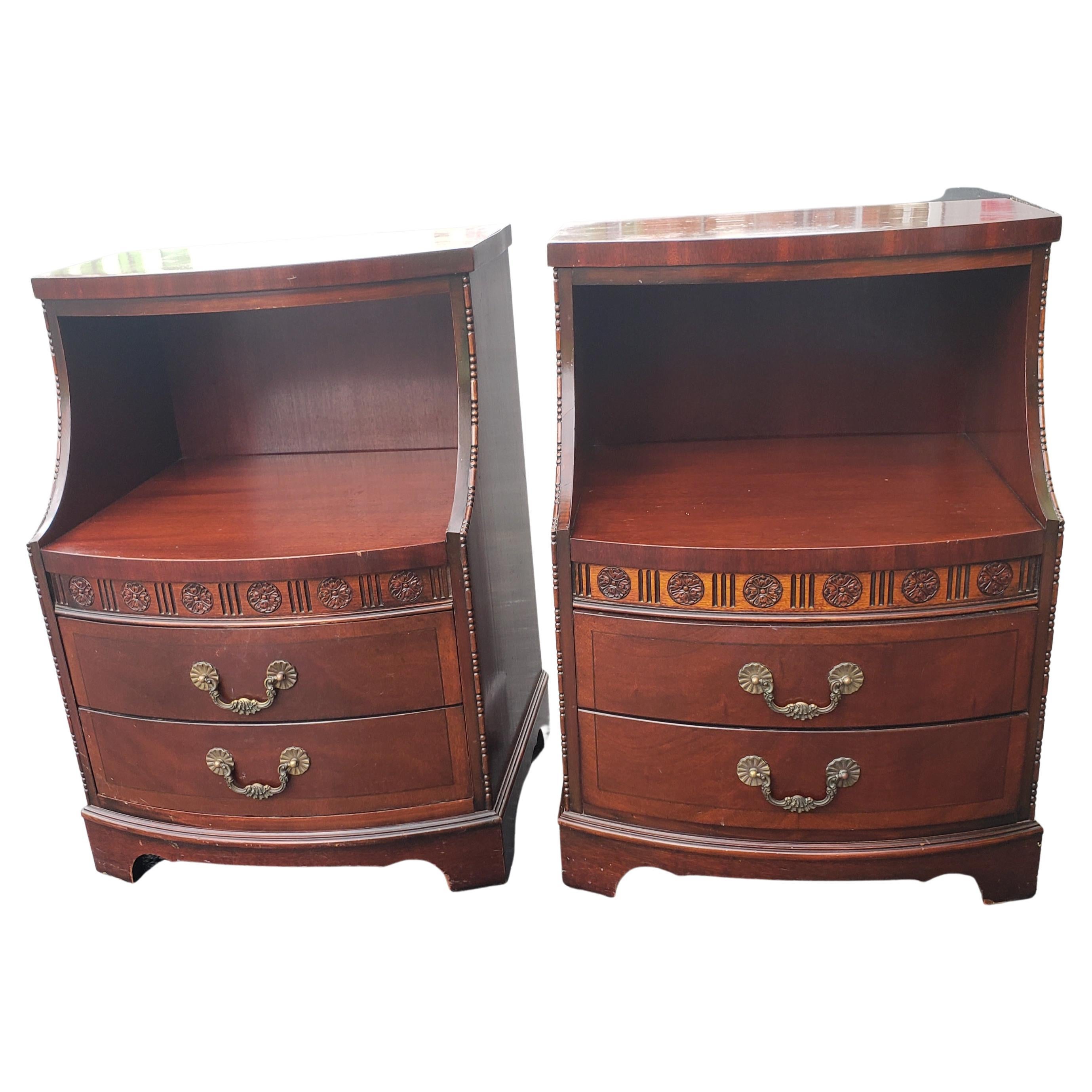 Fine pair of antique nightstands. Estate find. Highly desirable Kent Coffey high quality furniture. The Mainwaring collection. Beautiful rich mahogany, solids and veneers. Bow front with beading on the sides. Two roomy drawers, open center for