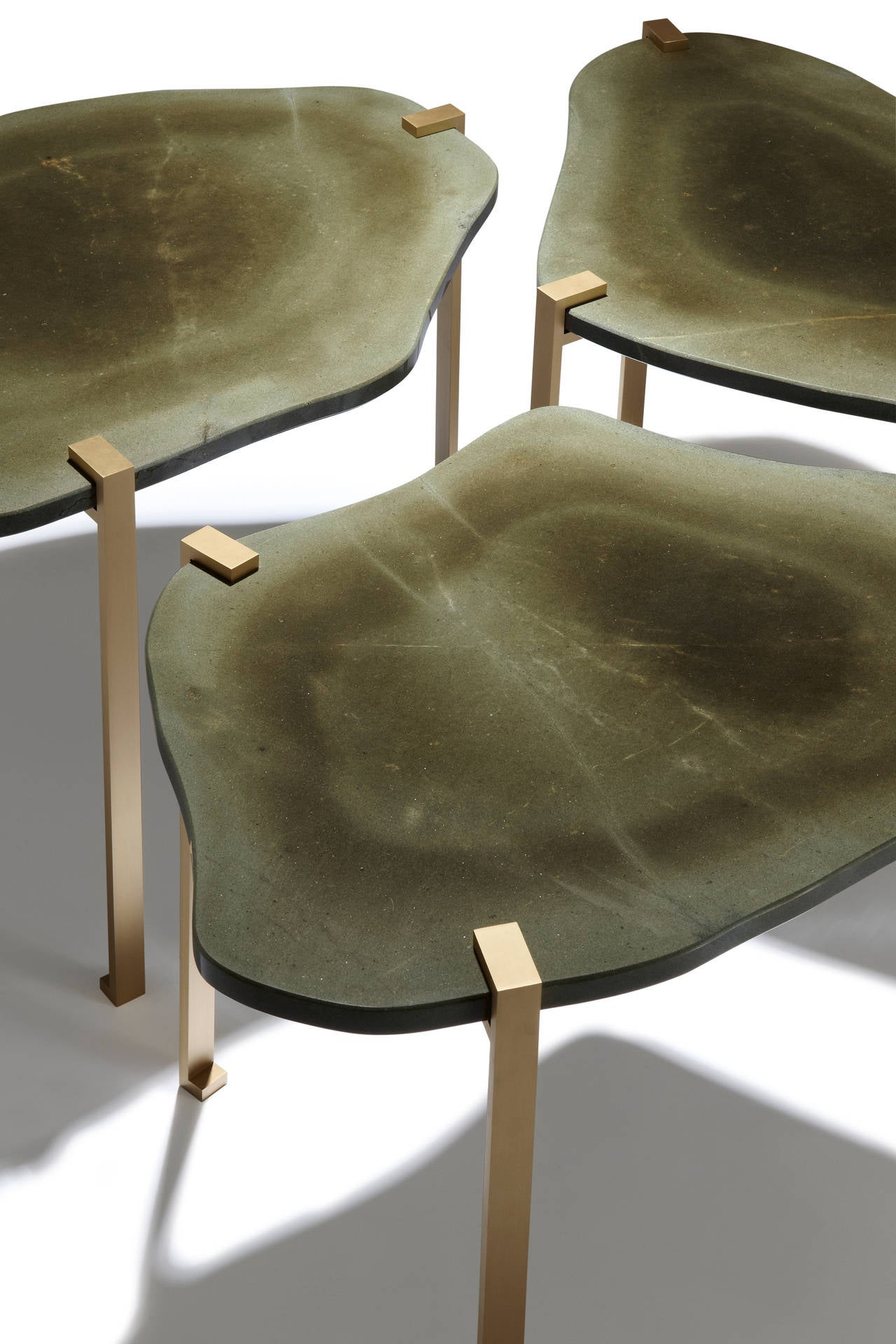 Turtle side tables designed by Hervé Langlais with marble top and satiated brass legs is from the collection Shifting Reflections, presented by Galerie Negropontes. The set is a one-off.

The collection includes some ten furniture designs by Hervé