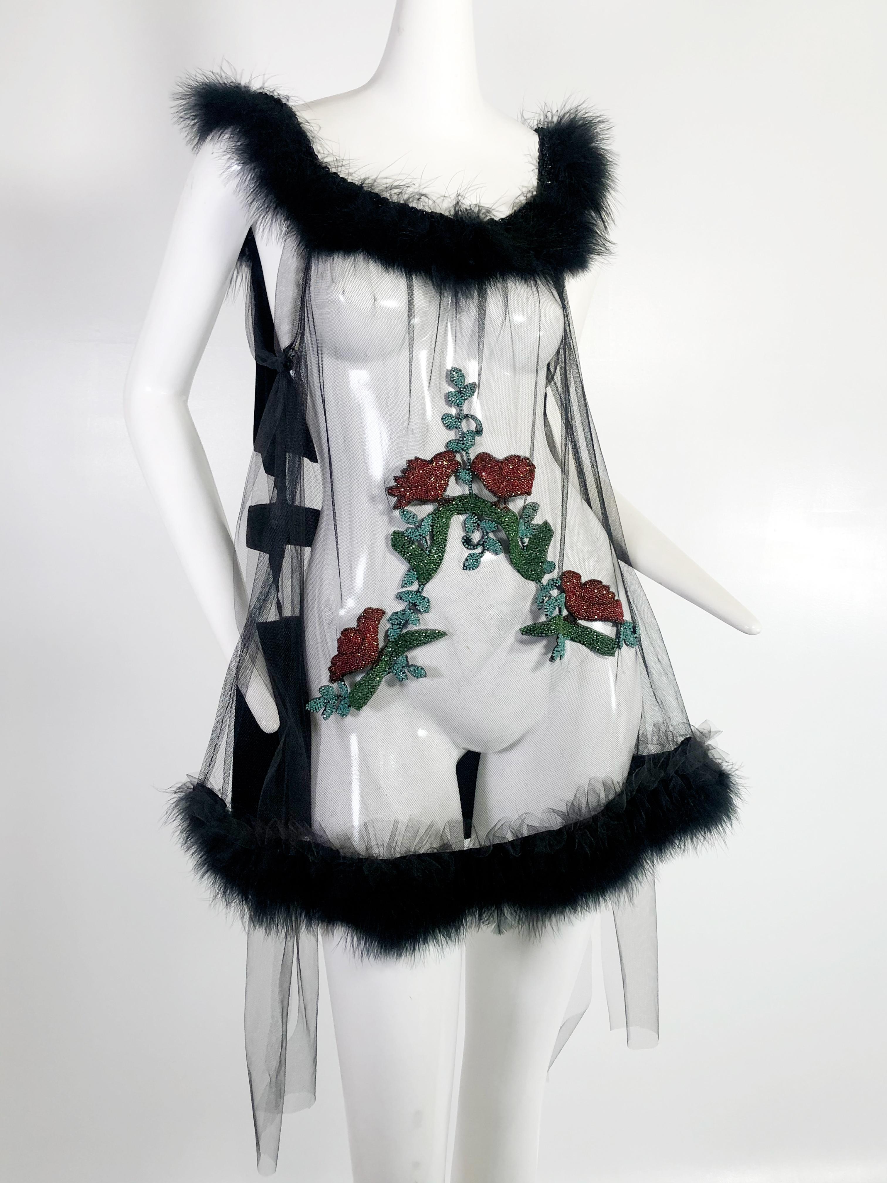 Side-tie teddy with 1920s beaded bird applique work and black swan's-down trim at hem and shoulder straps.  Silk velvet peek-a-boo blockwork back panel.