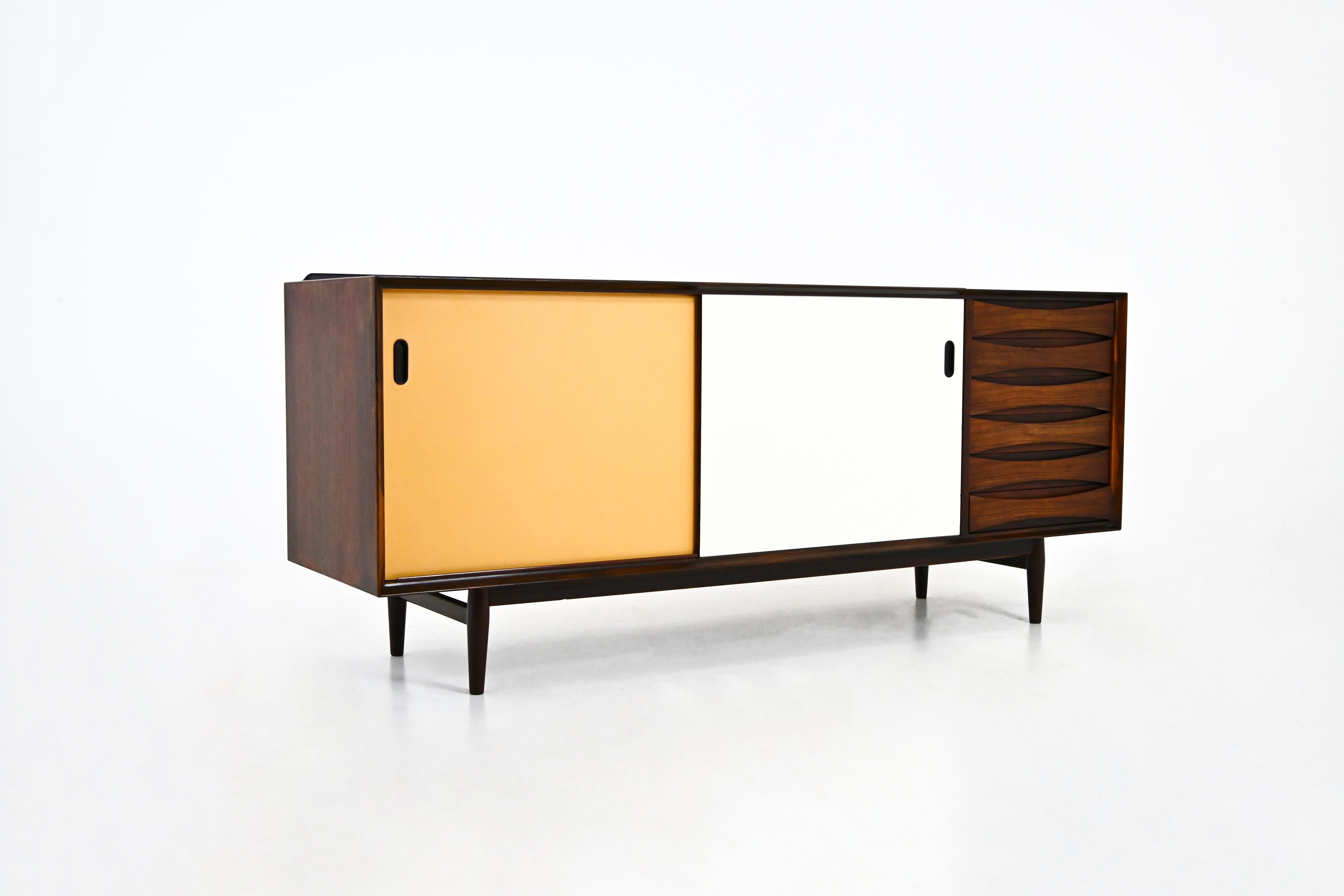 Wooden sideboard with 2 reversible sliding doors and 6 drawers. Model OS29. Stamped Sibast inside. Wear due to time and age of the sideboard 
FOR SHIPPING, REQUEST US FOR RECEIVE THE BEST PRICE
