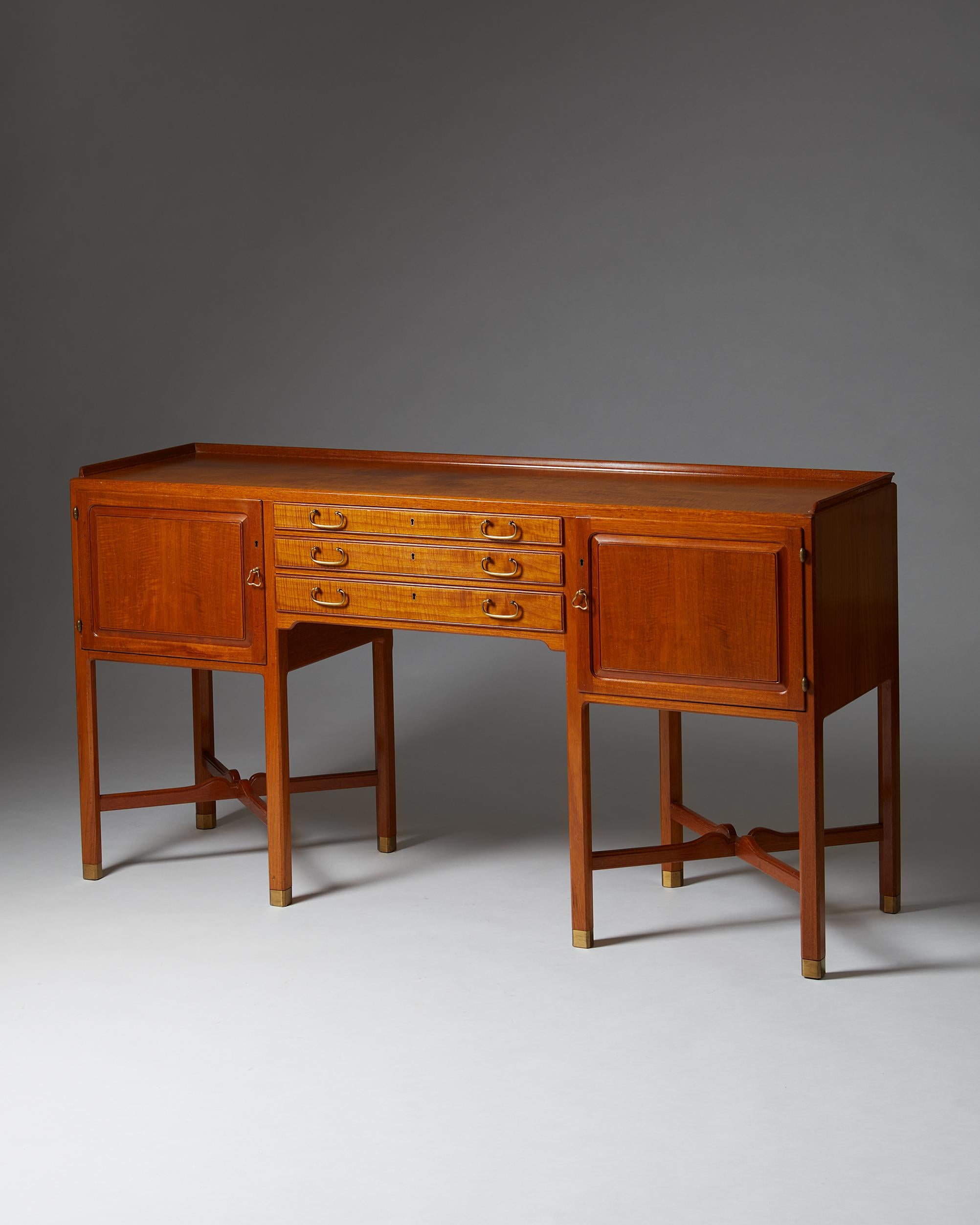 Sideboard, anonymous, for Nordiska Kompaniet,
Sweden, 1948.
Mahogany and brass.

Marked with label NK R46729 C 7 1 48

Measures: H 85.5 cm/ 2'10 1/8
