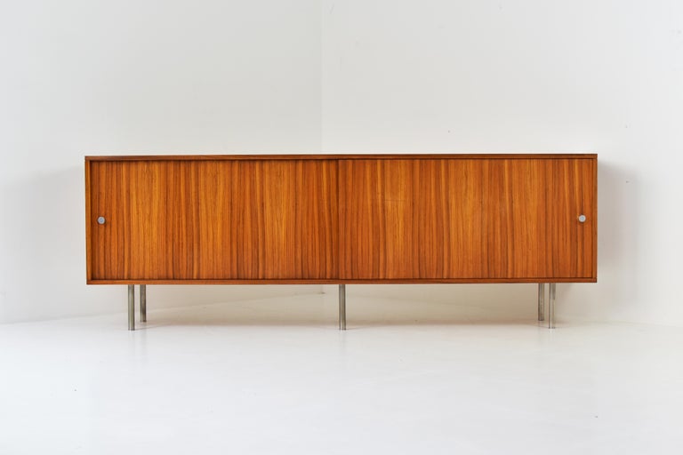 Rare version of this minimalist sideboard in rosewood by Alfred Hendrickx for Belform, Belgium 1950s. This credenza features the original legs and doorhandles in brushed steel. Very nice grain and in a good original condition.