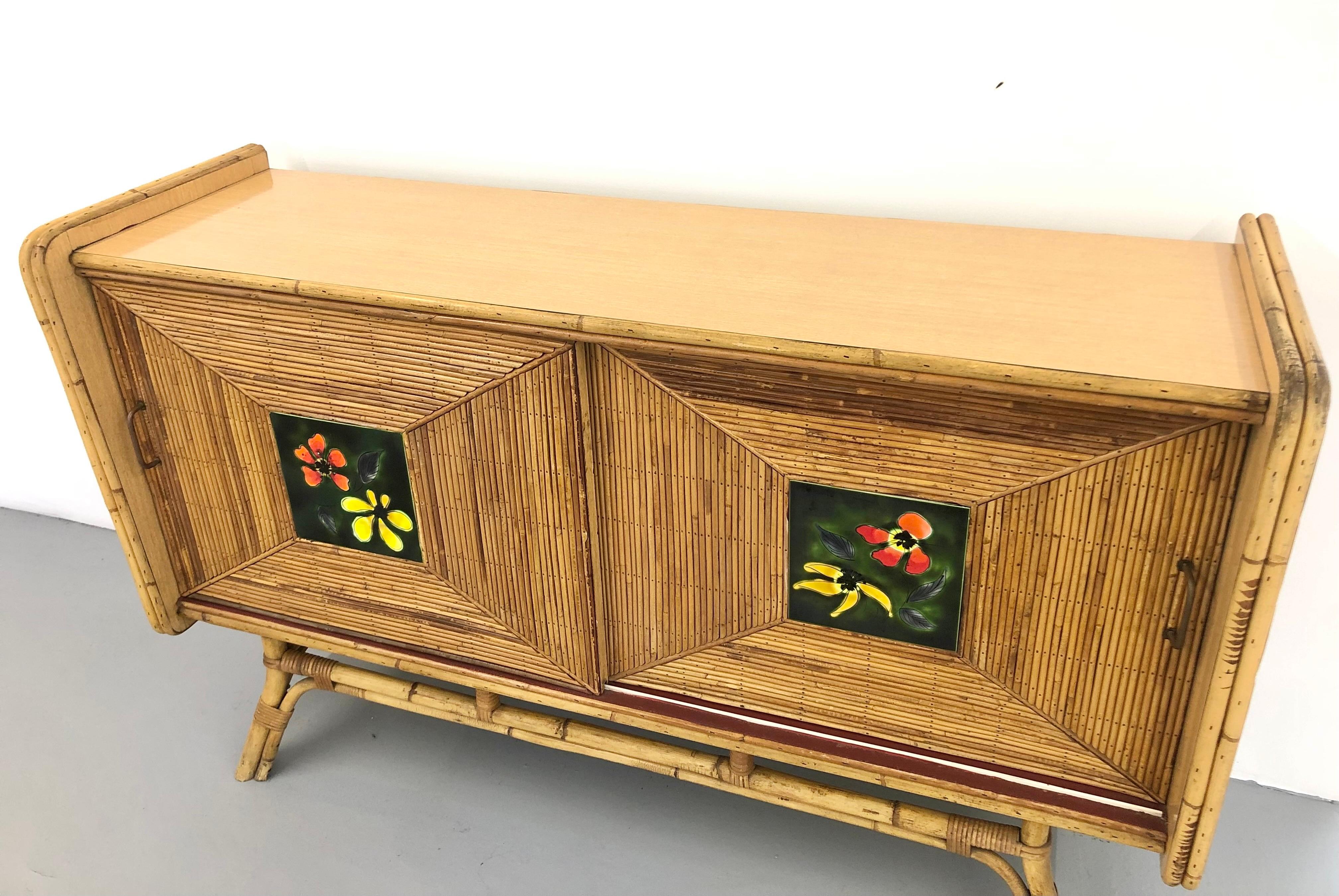 Magnificent and charming split pencil bamboo sideboard from the 1950s by Adrien Audoux and Frida Minet.

