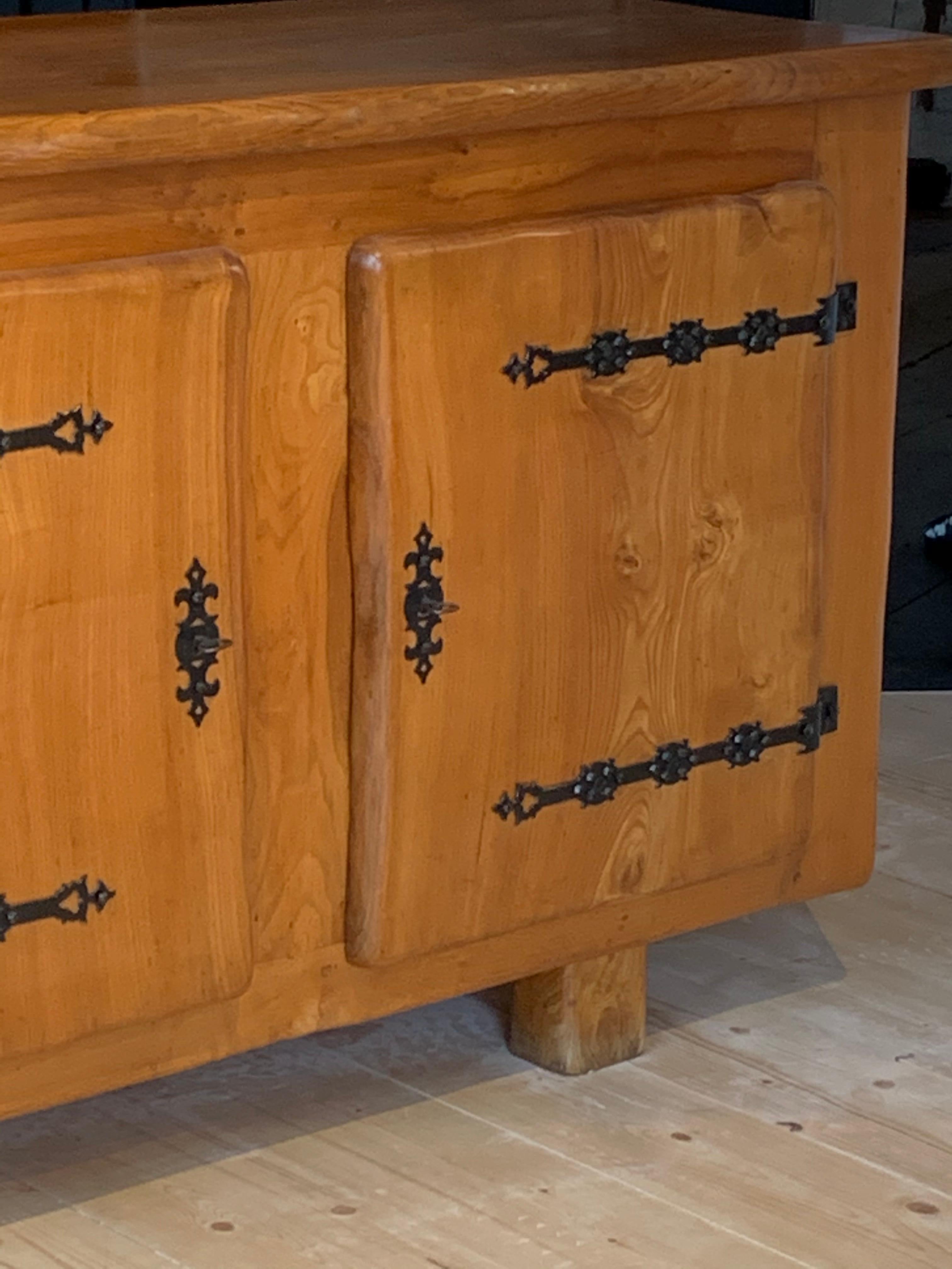 Sideboard by Charles Flandre
Carved elmwood with wrought iron hinges and lock
Monumental size,
circa 1950, France
Very good vintage condition
Charles Flandre, 20th century French carpenter, known for his carved wooden furniture and his