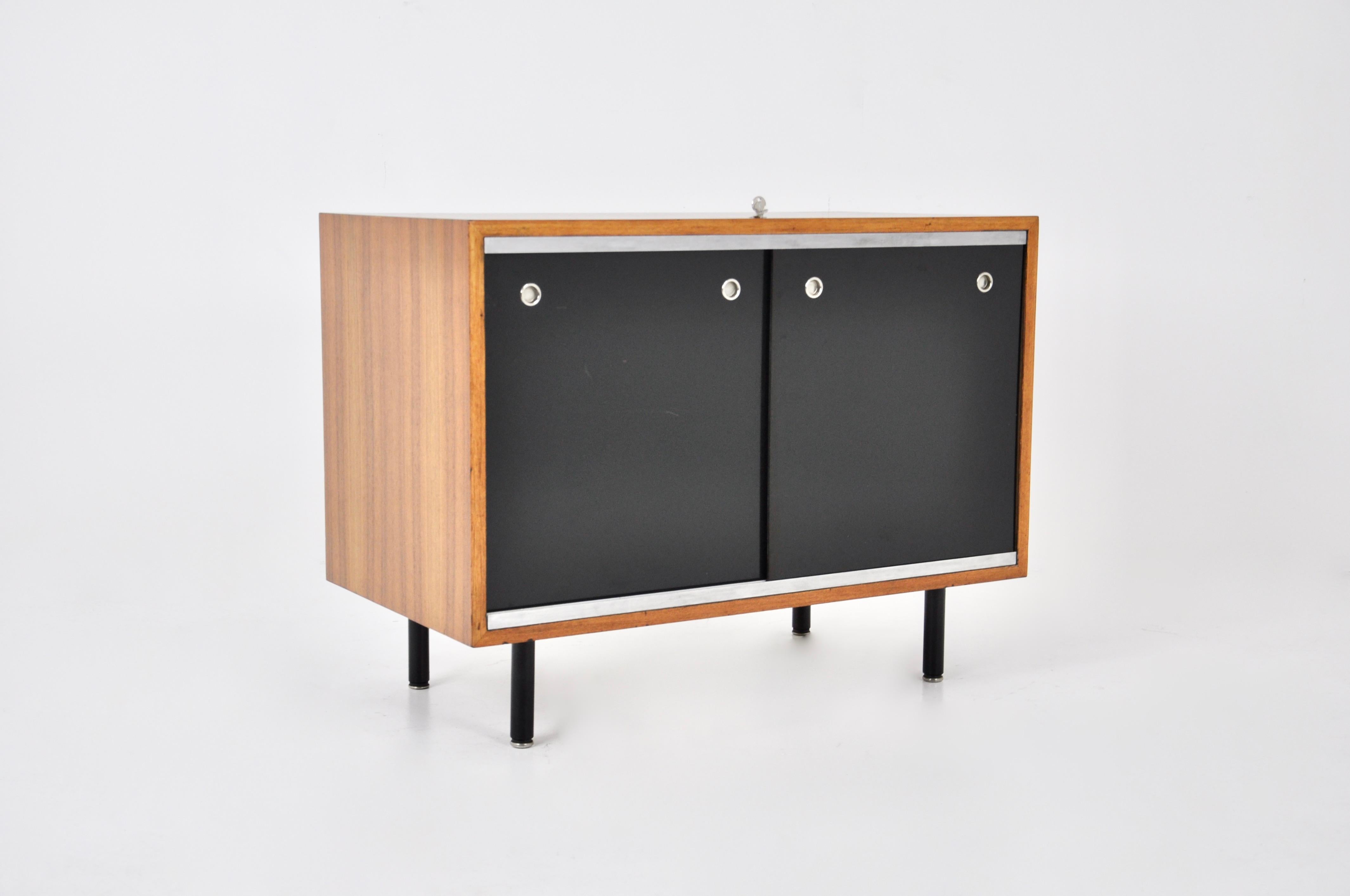 Wooden sideboard with 5 drawers and metal legs. Wear due to time and age.
 