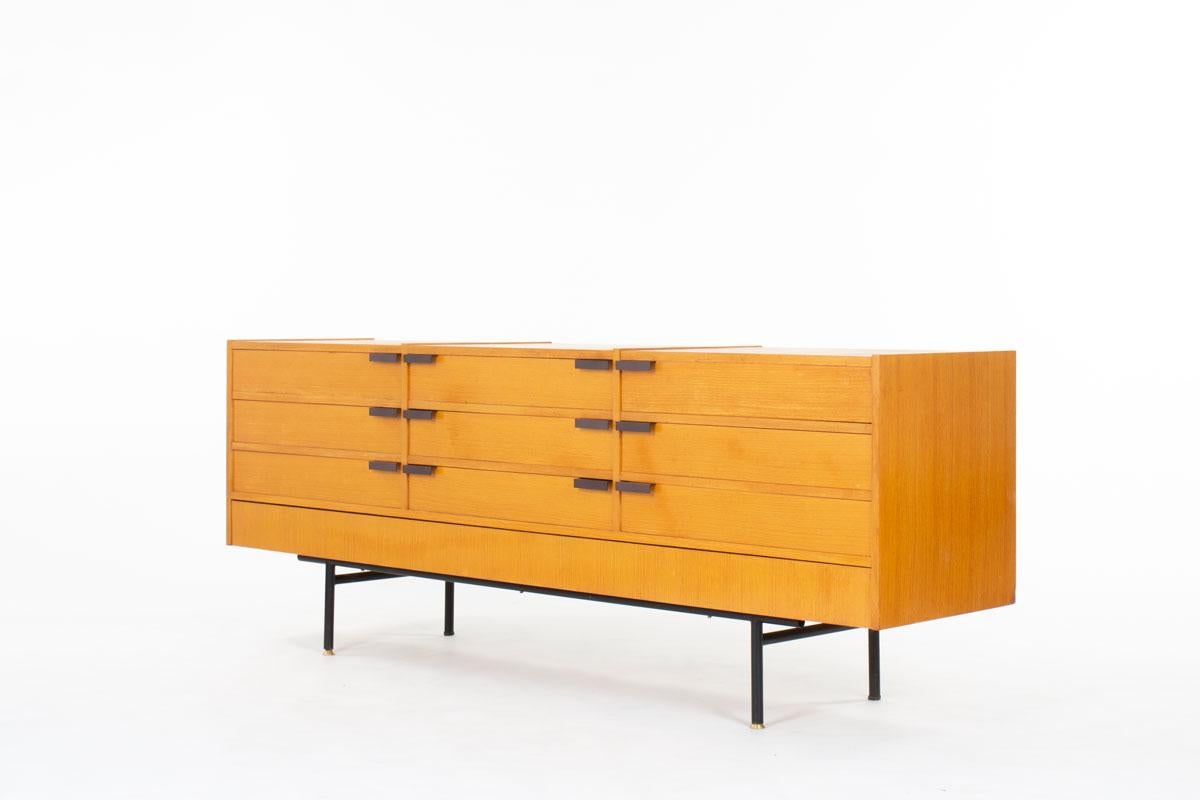Sideboard designed by Gerard Guermonprez for Magnani in the fifties
Feet in black lacquered metal and structure in ash
Iconic model