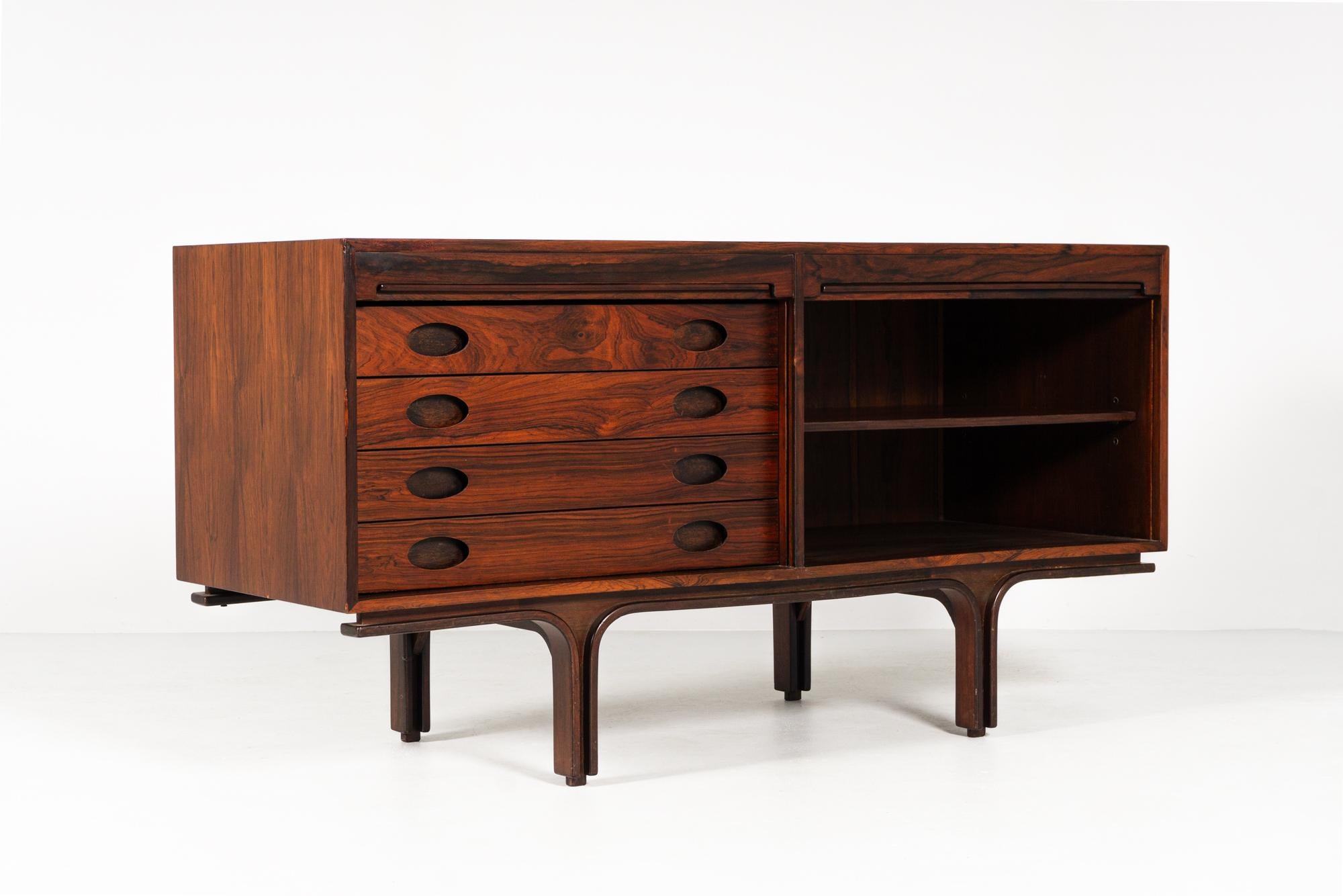 Sideboard by Gianfranco Frattini, Bernini Italy, 1961

Materials & Techniques Notes: rosewood, 
2 tambour style roll down fronts, 
4 drawers,
free-standing