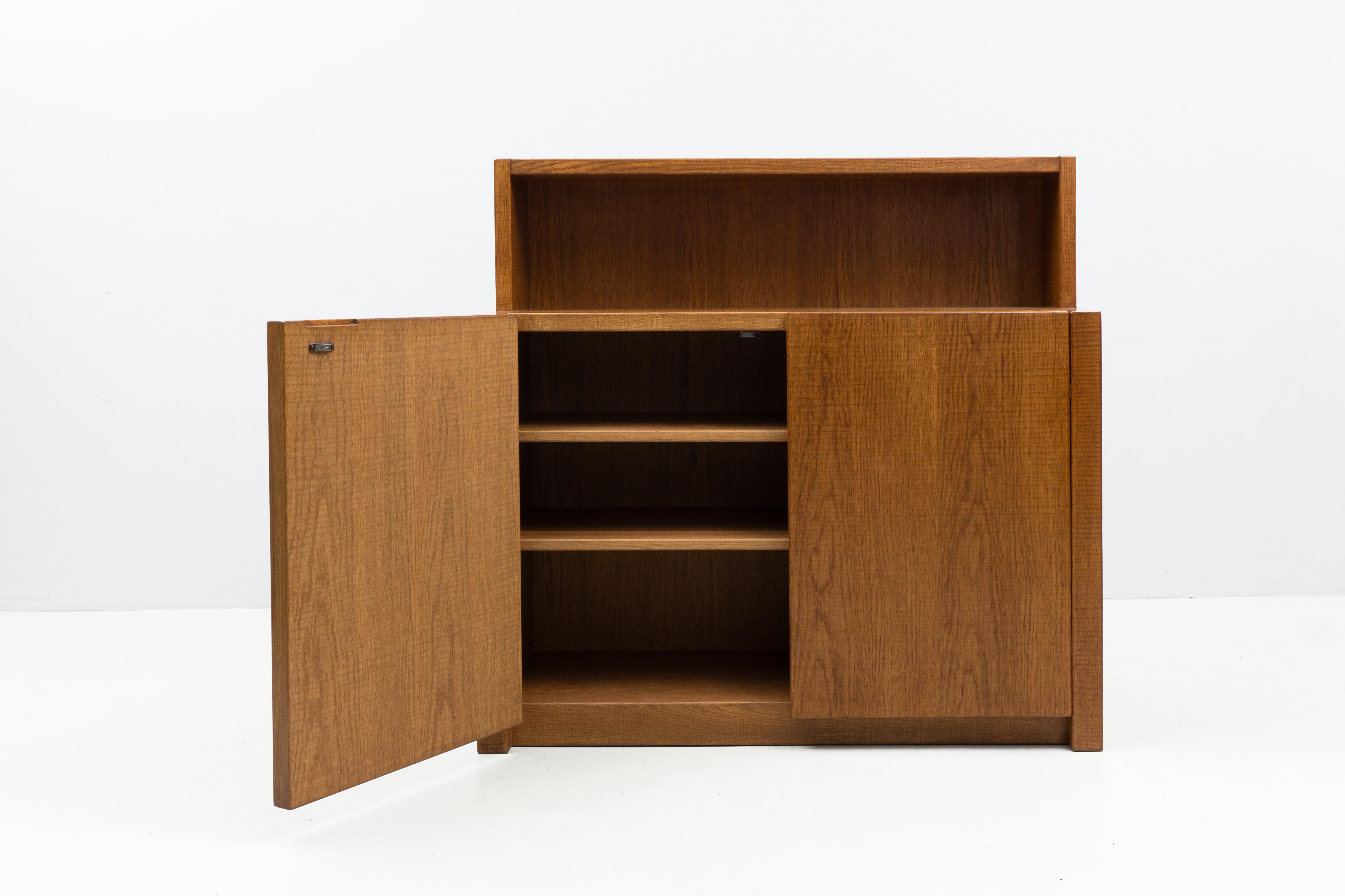 This rare and unique solid oak sideboard was handmade in a small studio in Brescia, Italy around 1975 by the designer and manufacturer Giuseppe Rivadossi. Its design is both minimalistic and intriguing due to its hand chiseled surface.
The