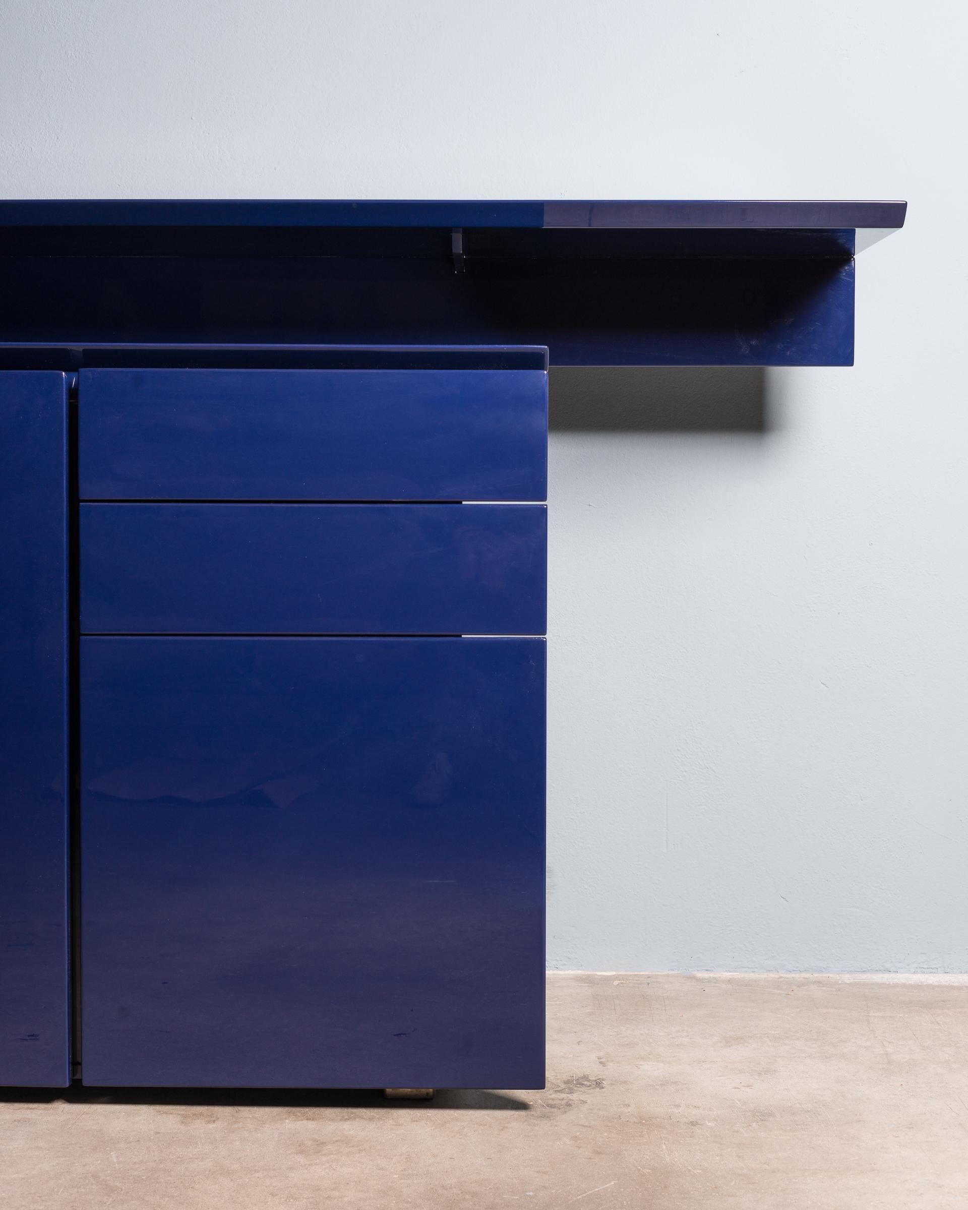 Sideboard by Giovanni Offredi for Saporiti Italia. The internal draws and cupboards are finished in bird's-eye maple and the exterior has been newly restored and finished in Italian lacquer.