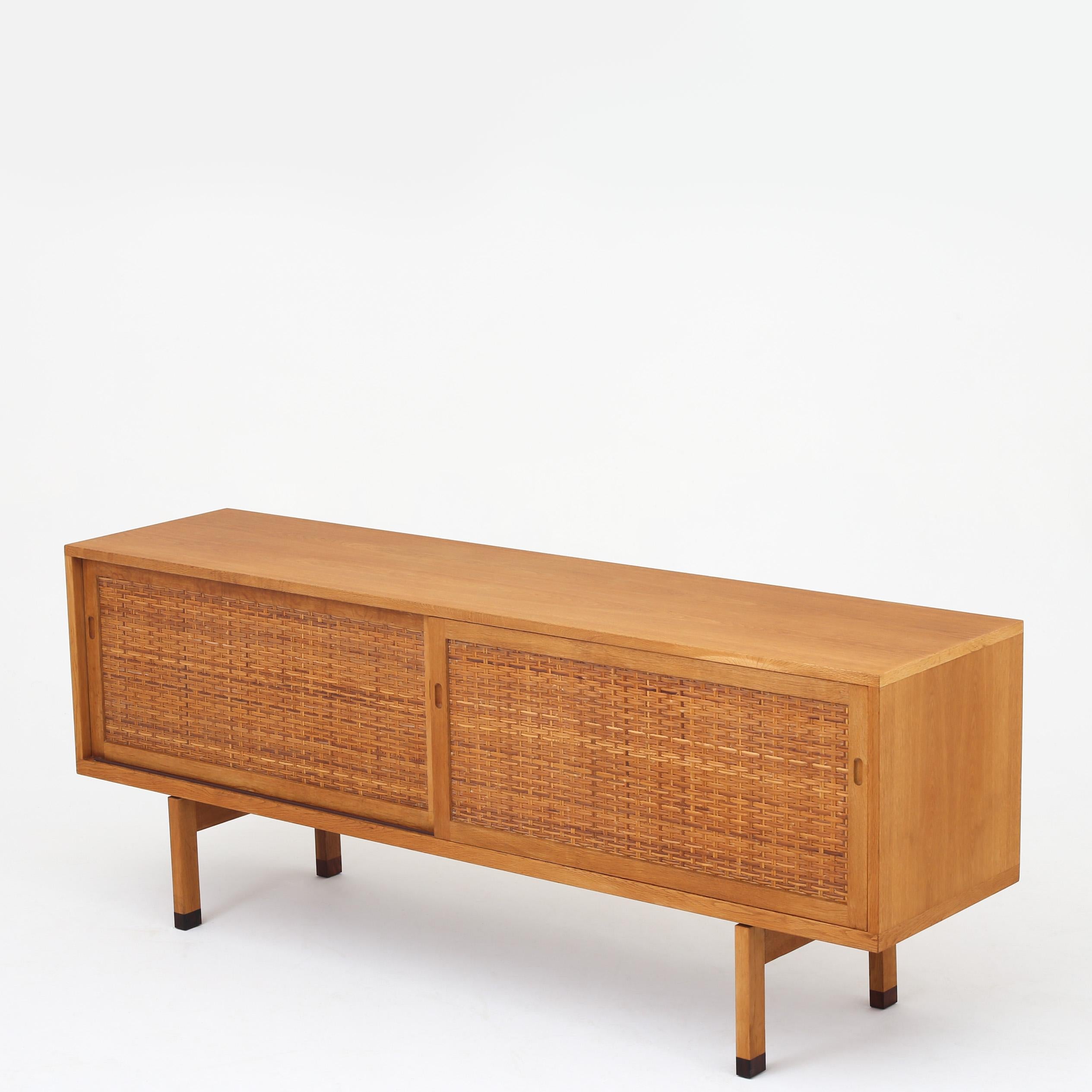 Hans J. Wegner RY 26 - Sideboard in patinated oak and cane with square legs. Maker RY Møbler.