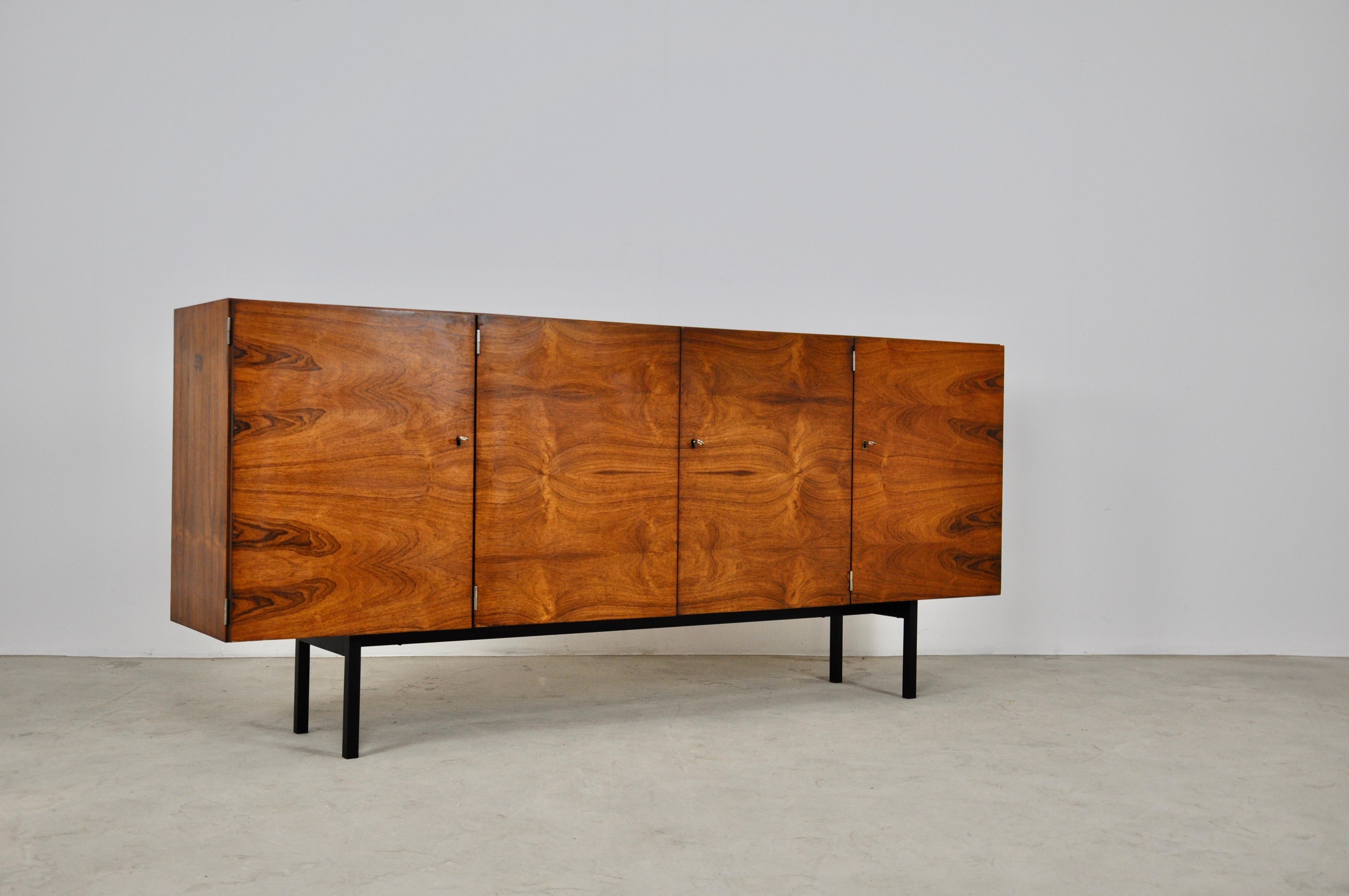 Sideboard composed of 4 doors, black metal base. Wear due to time and the age of the sideboard.
 