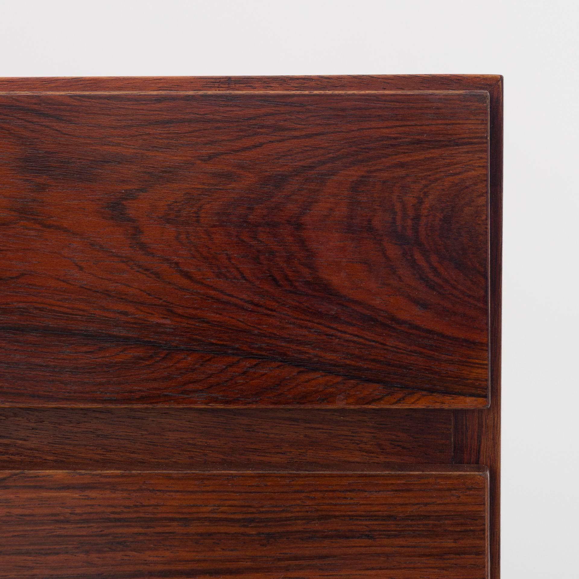 FA 66 - Sideboard in rosewood with four drawers and four doors with interior of rosewood. Maker Faarup Møbelfabrik.