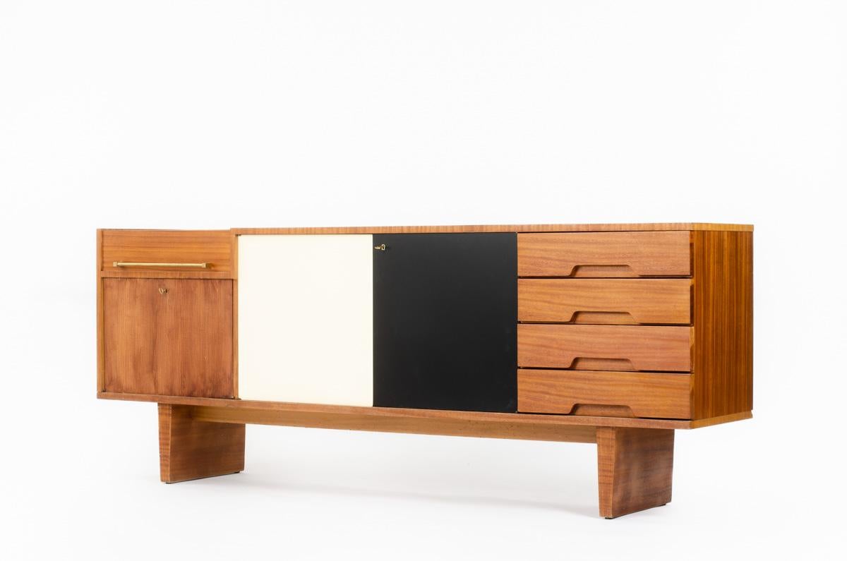 Large sideboard by Robert Debieve edited by Les Huchers Minvielle in the 50s
Signed on the back, see photo
Entirely in wood 
2 lacquered doors in front 
Very Large model !! 2.30 m of length
Some traces of time