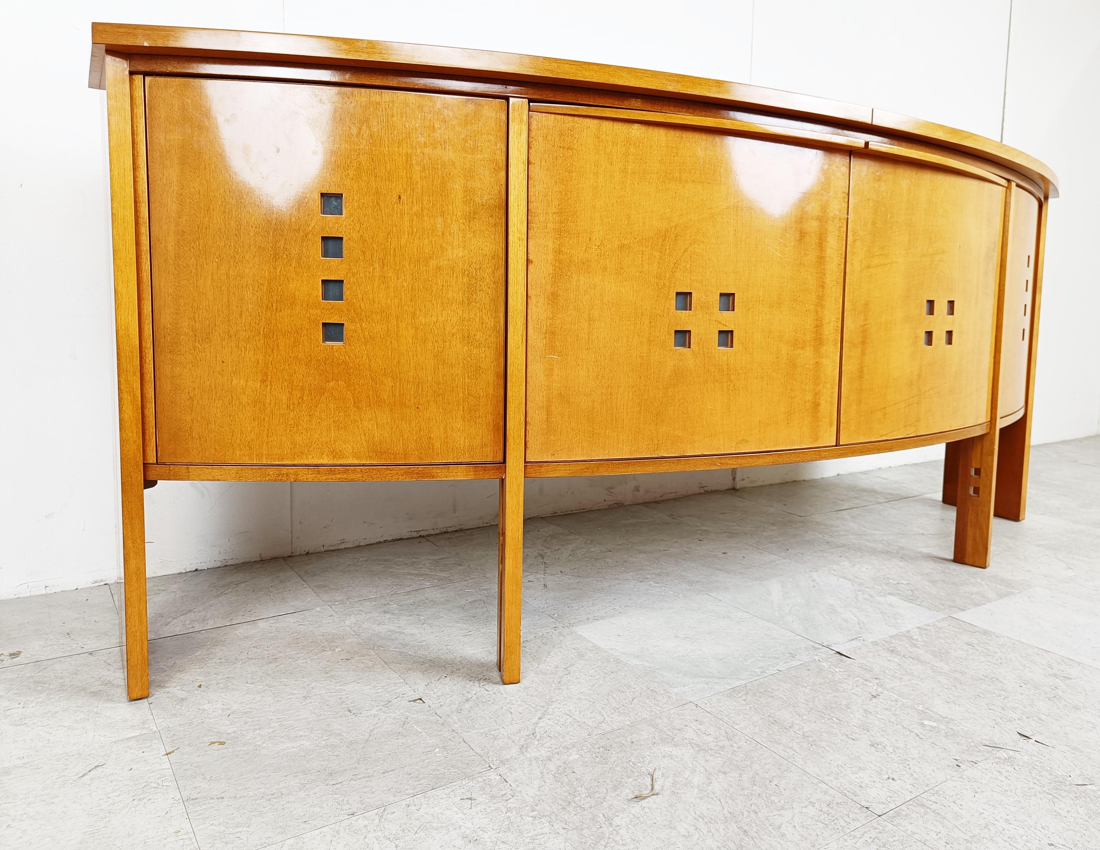 Exceptional sideboard designed by Umberto Asnago for Giorgetti.

The sideboard is made out of high quality wood as you would expect from Giorgetti furniture.

Beautifully curved designed and beautifully finished both inside and outside

Good