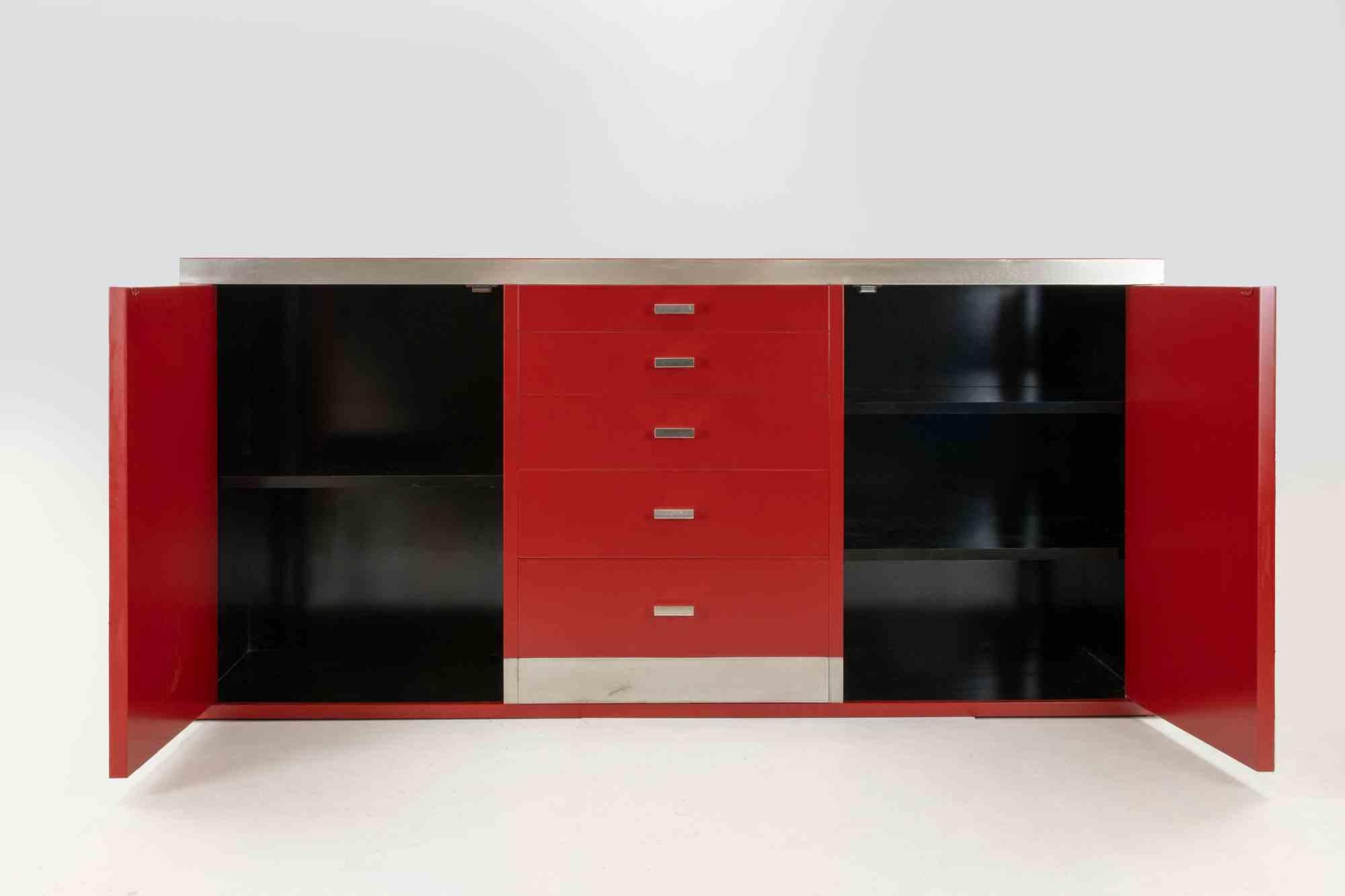 Willy Rizzo sideboard  is a mid-century design  living room set realized by by Willy Rizzo for Mario Sabot  in 1970s

Structure is composed by solid wood laquered and veneered by red laminate. Metal chrome plating for handles and corners.Central