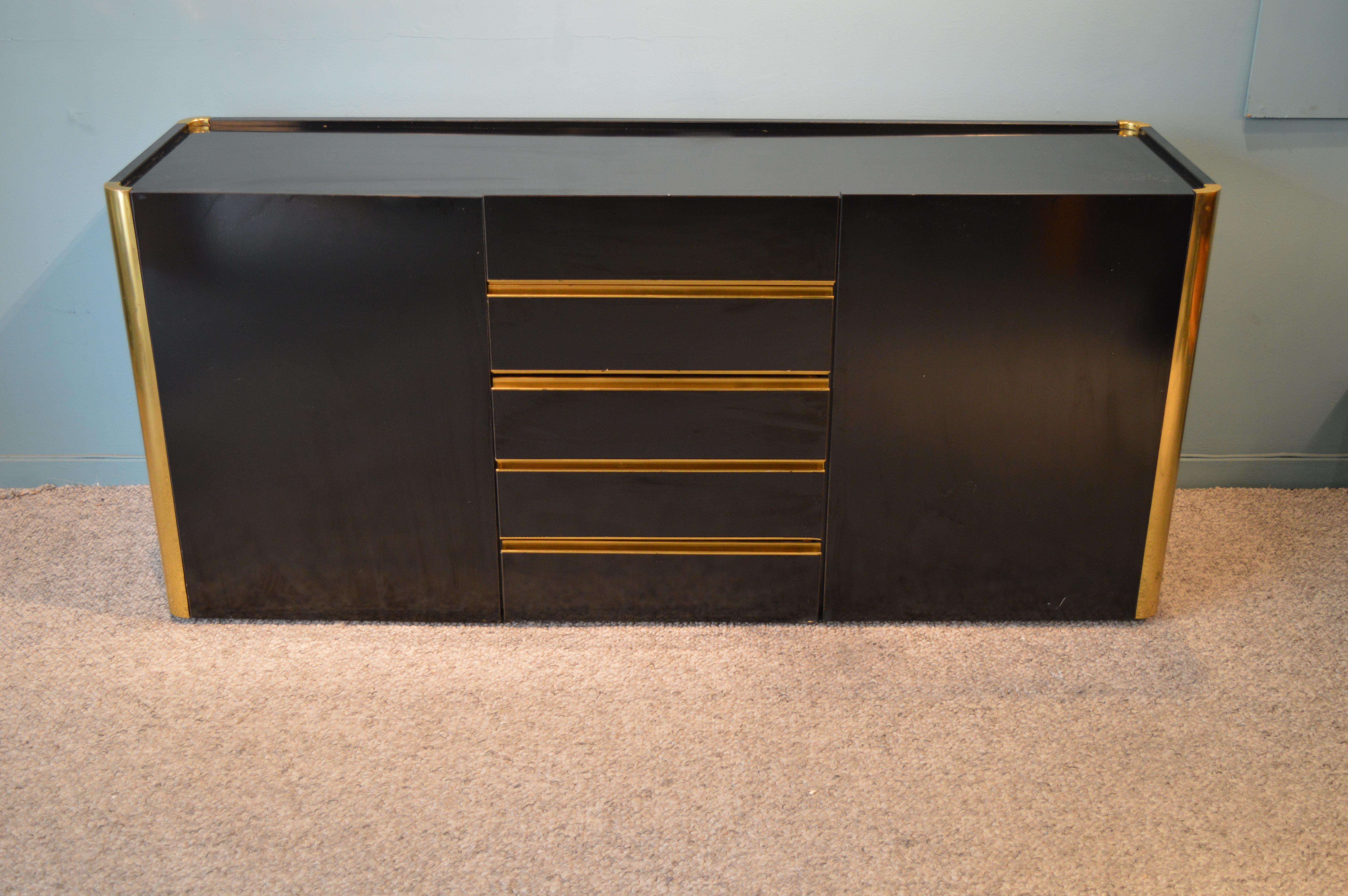 Sideboard by willy Rizzo for Mario Sabot.
Heavy quality laminated wood and elegant brass details.
Italian work circa 1972.
